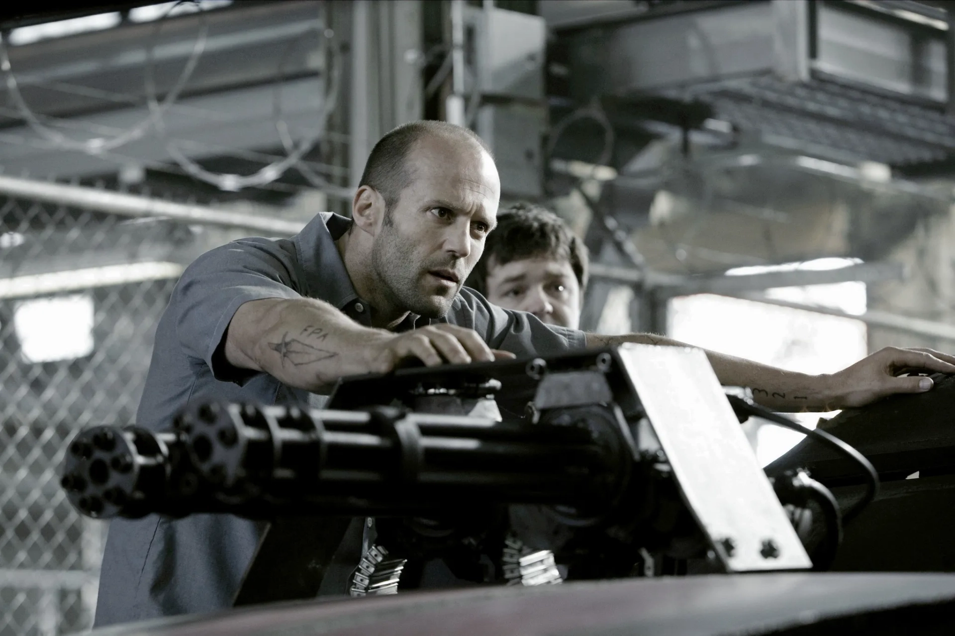 Jason Statham and Frederick Koehler in Death Race (2008)
