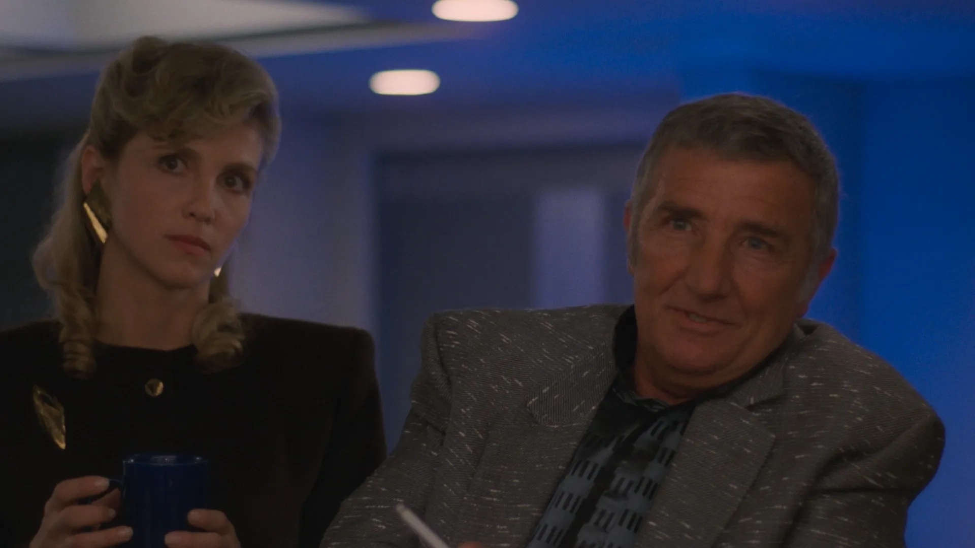 Richard Dawson and Karen Leigh Hopkins in The Running Man (1987)