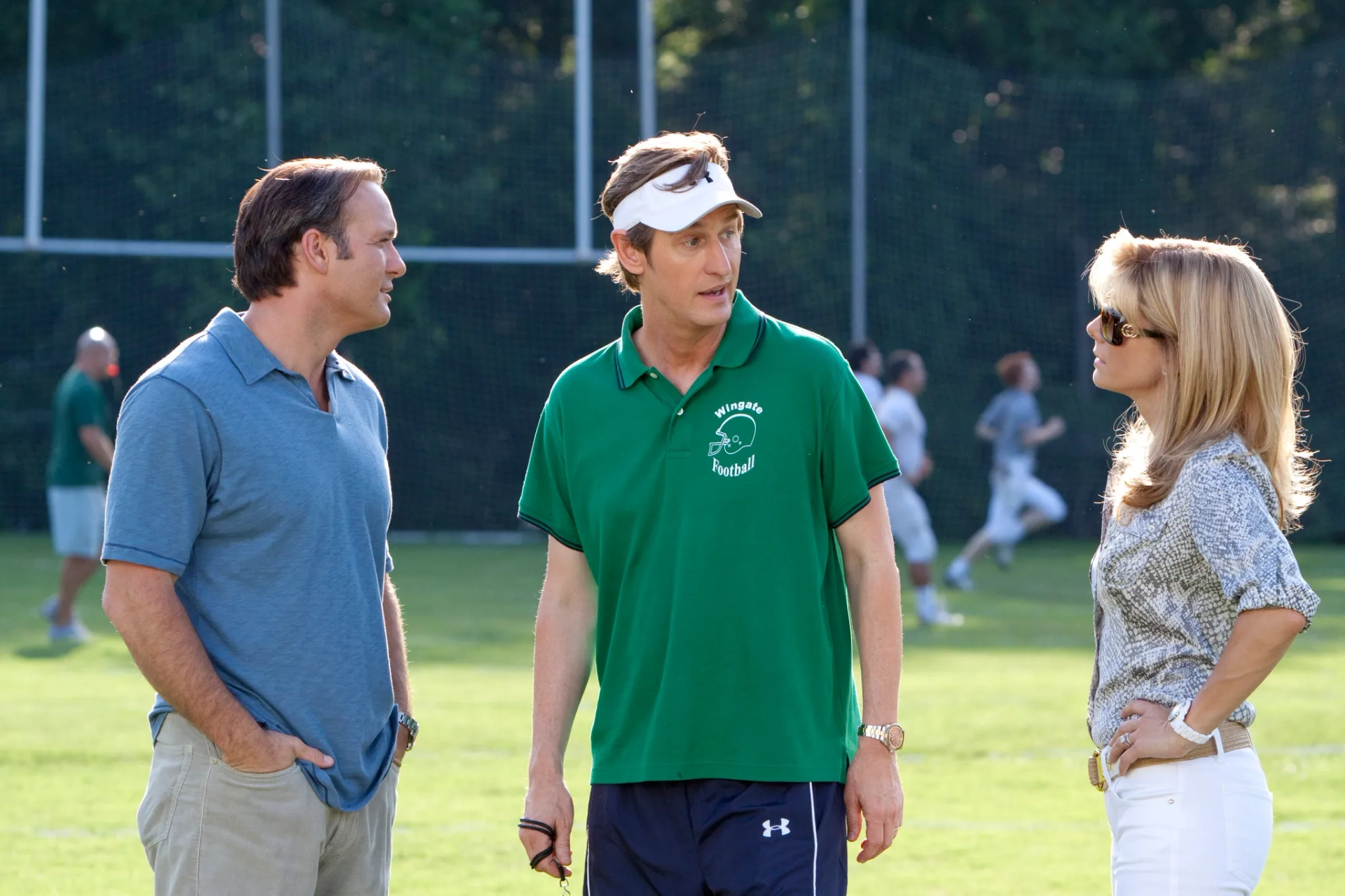 Sandra Bullock, Tim McGraw, and Ray McKinnon in The Blind Side (2009)