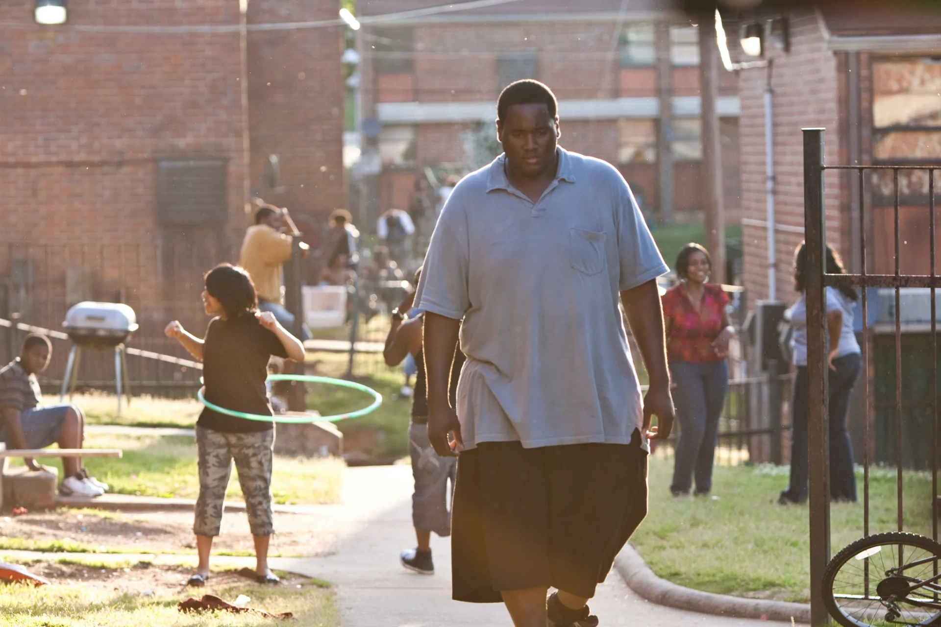 Quinton Aaron, Ryan Kightlinger, Kirsten VanWagner, and Lauren Rothermel in The Blind Side (2009)