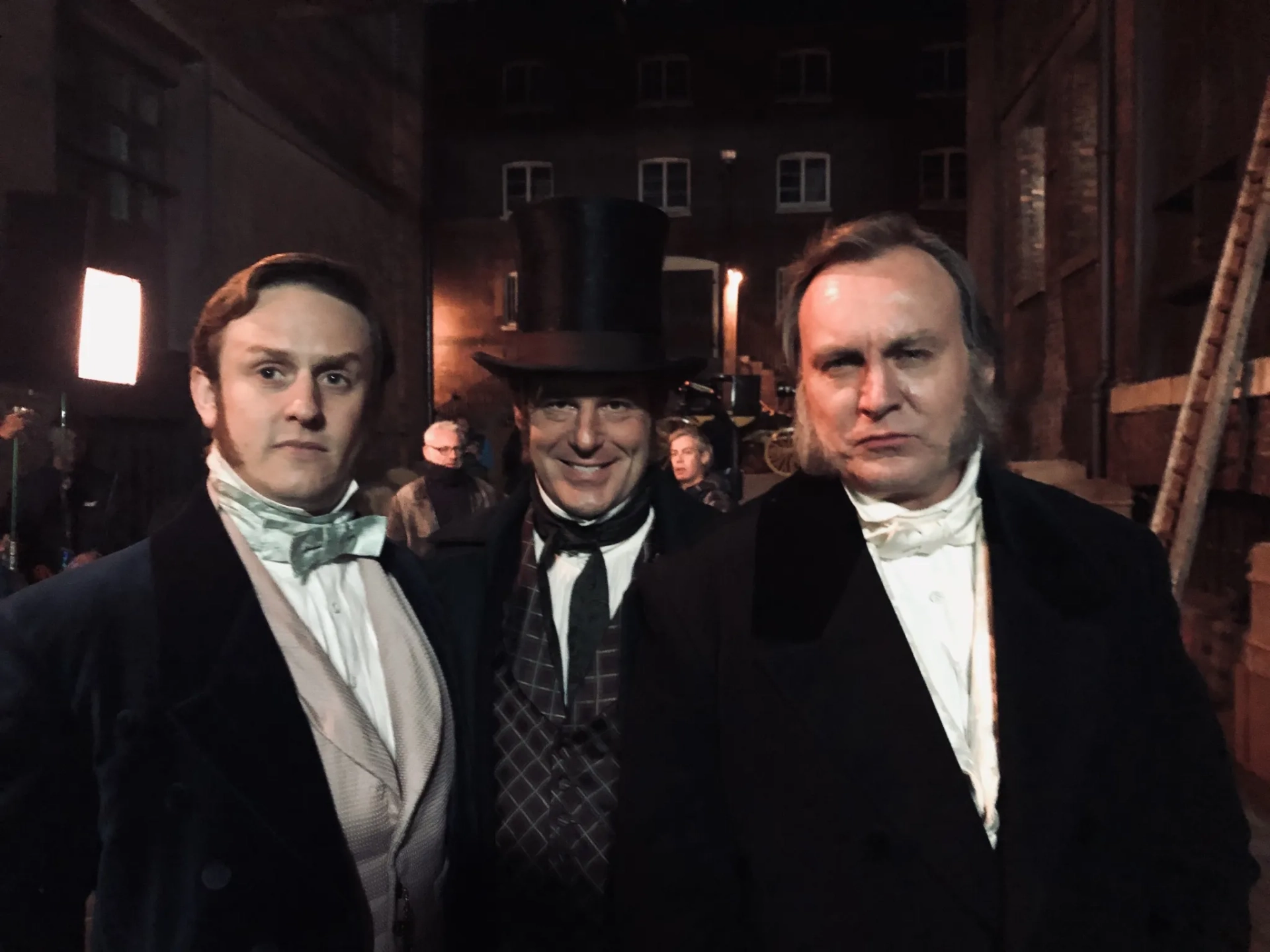 Richard Goulding, Adam James & Phillip Glenister on set in Belgravia