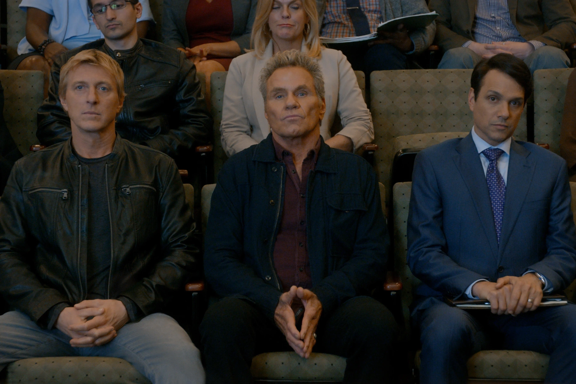 Ralph Macchio, Martin Kove, and William Zabka in The Good, The Bad, and the Badass (2021)