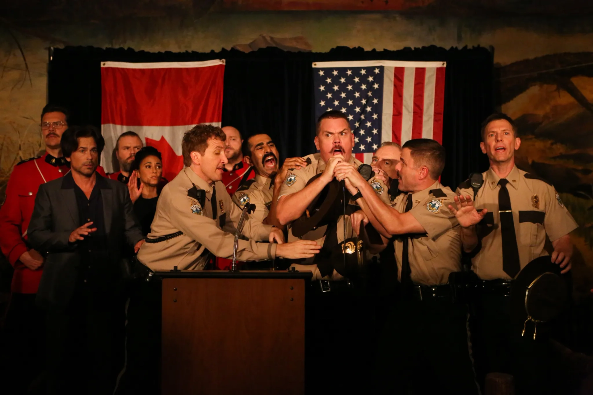 Rob Lowe, Brian Cox, Emmanuelle Chriqui, Jay Chandrasekhar, Kevin Heffernan, Tyler Labine, Steve Lemme, Will Sasso, Paul Soter, Erik Stolhanske, and Hayes MacArthur in Super Troopers 2 (2018)