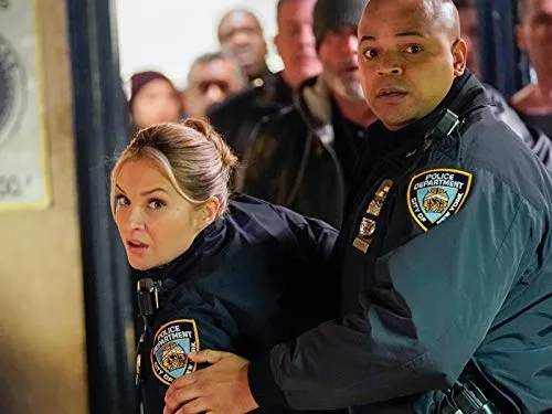 Vanessa Ray and Justin Cunningham in Fog of War (2020)