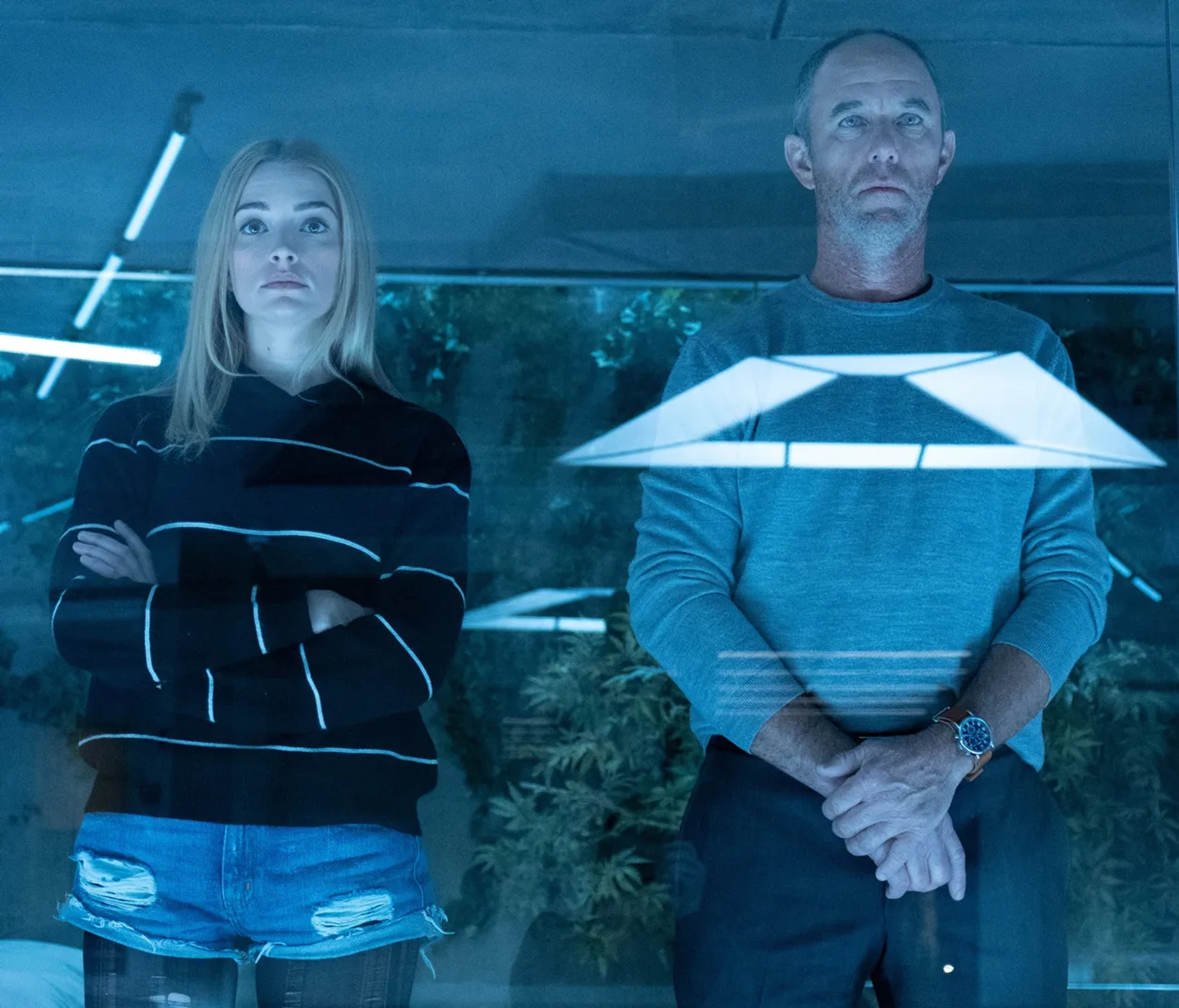 Jamie McShane and Brianne Howey in The Passage (2019)