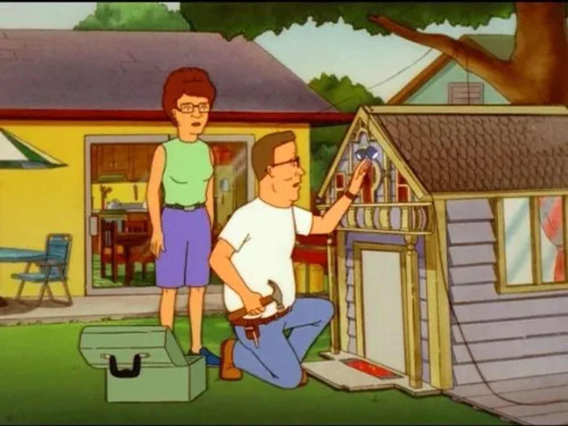 Kathy Najimy and Mike Judge in King of the Hill (1997)
