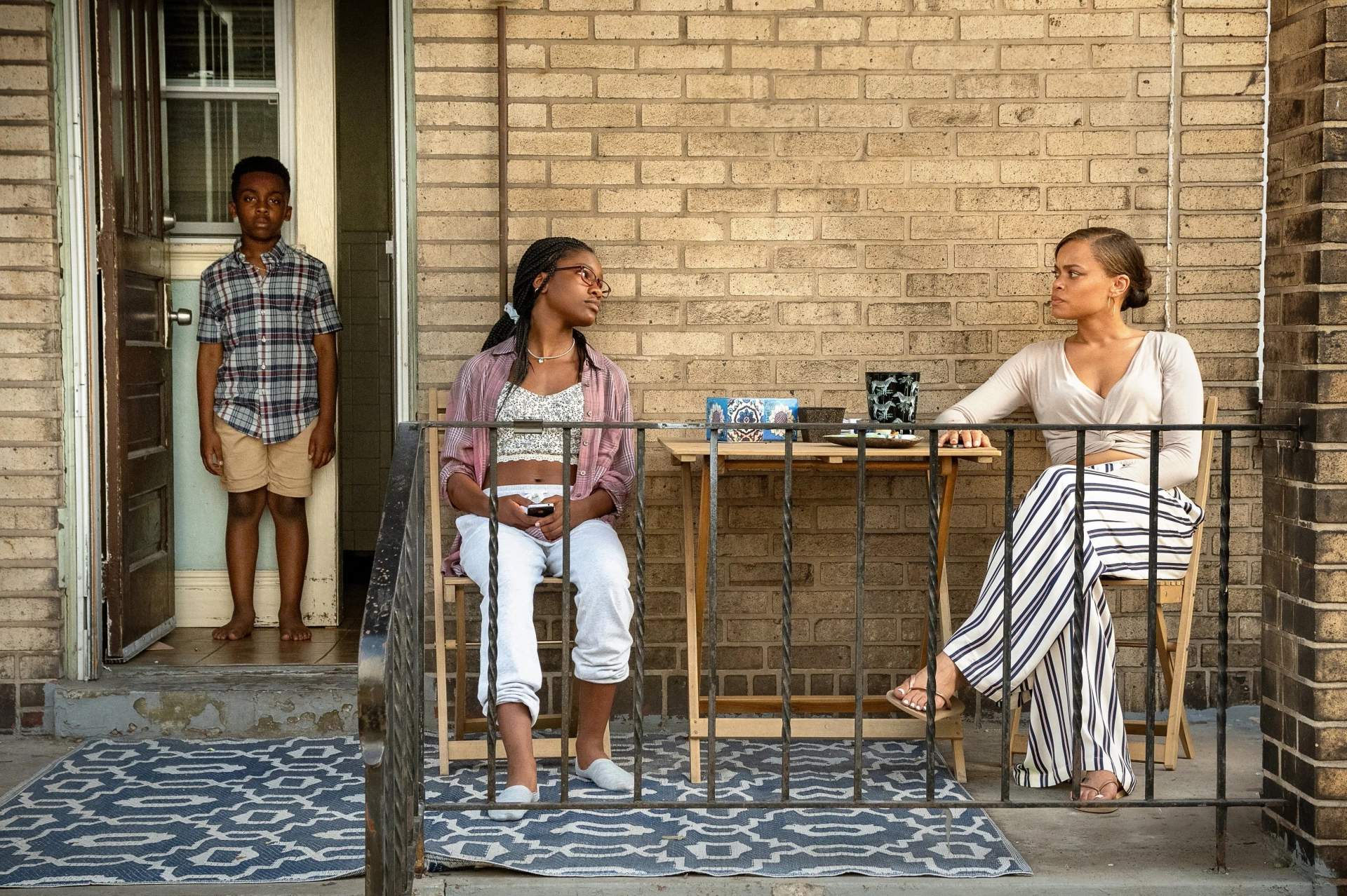 Anthony B. Jenkins, Andra Day, and Demi Singleton in The Deliverance (2024)