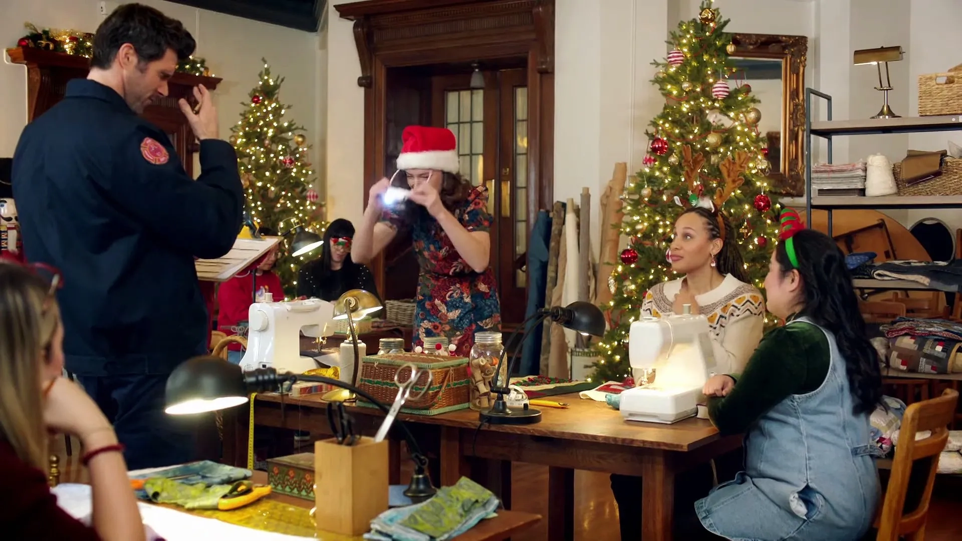 Jo Anne Tacorda, Harmon Walsh, and Ferelith Young in A Cozy Christmas Quilt (2023)