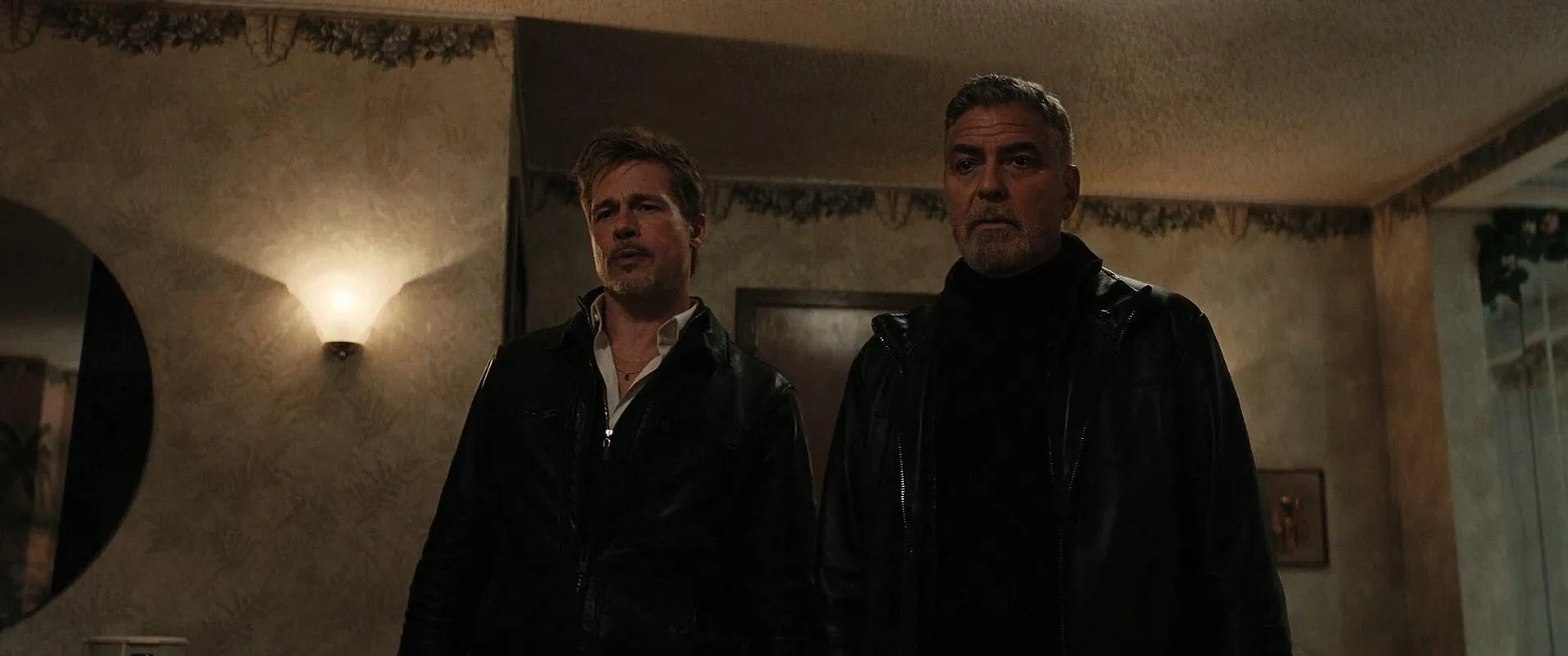 Brad Pitt and George Clooney in Wolfs (2024)