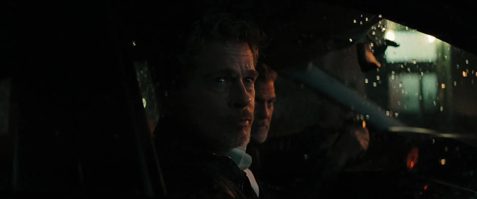 Brad Pitt and George Clooney in Wolfs (2024)