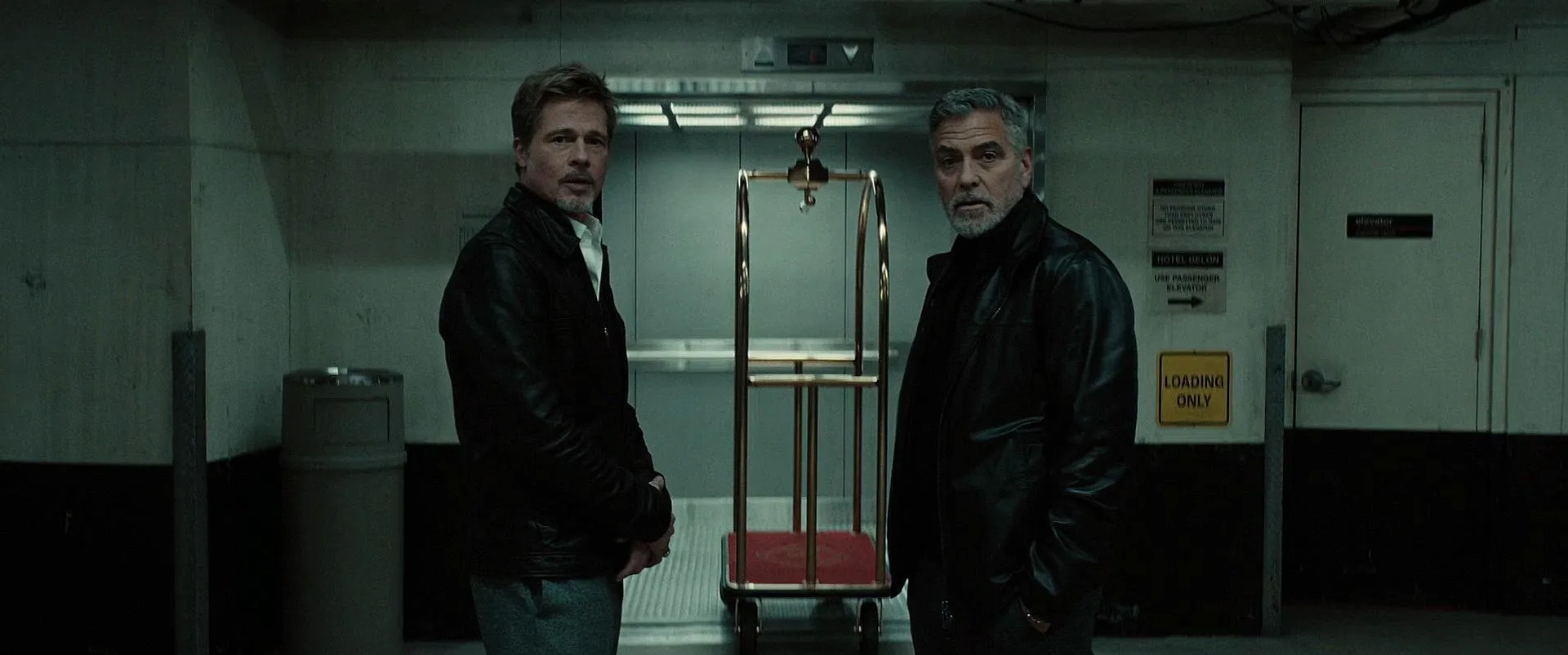 Brad Pitt and George Clooney in Wolfs (2024)