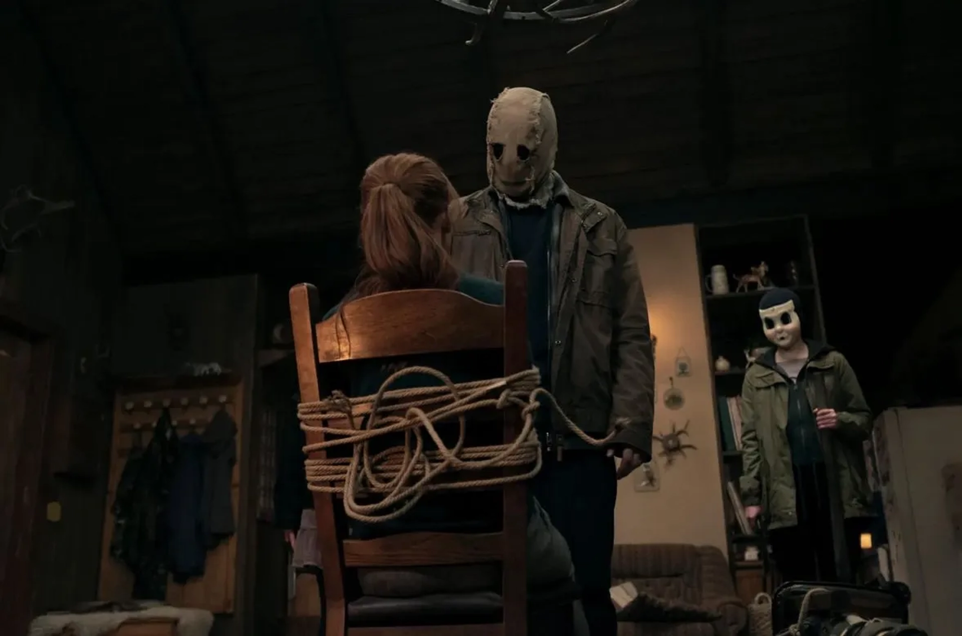 Olivia Kreutzova, Madelaine Petsch, and Matus Lajcak in The Strangers: Chapter 1 (2024)