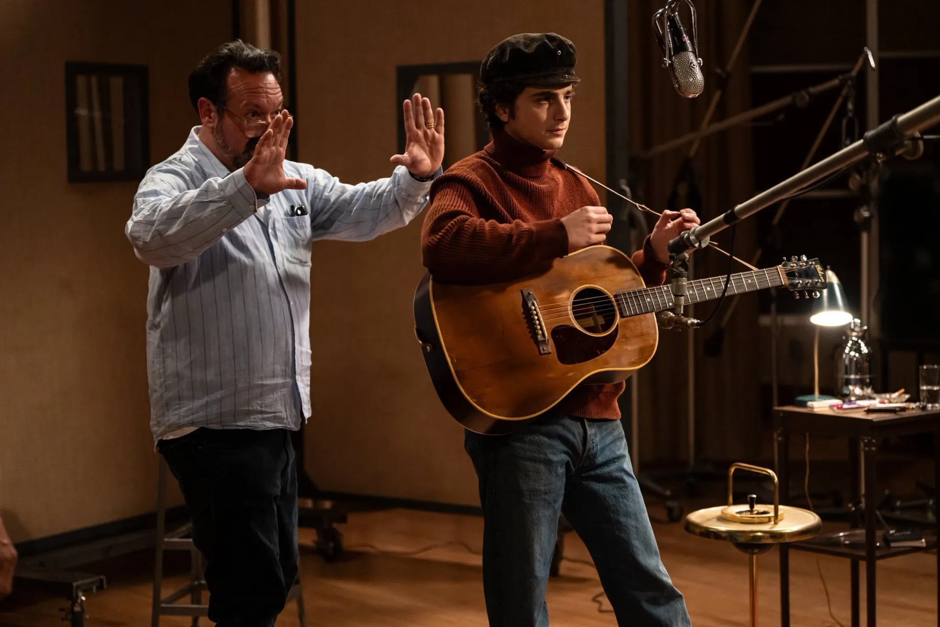 James Mangold and Timothée Chalamet in A Complete Unknown (2024)