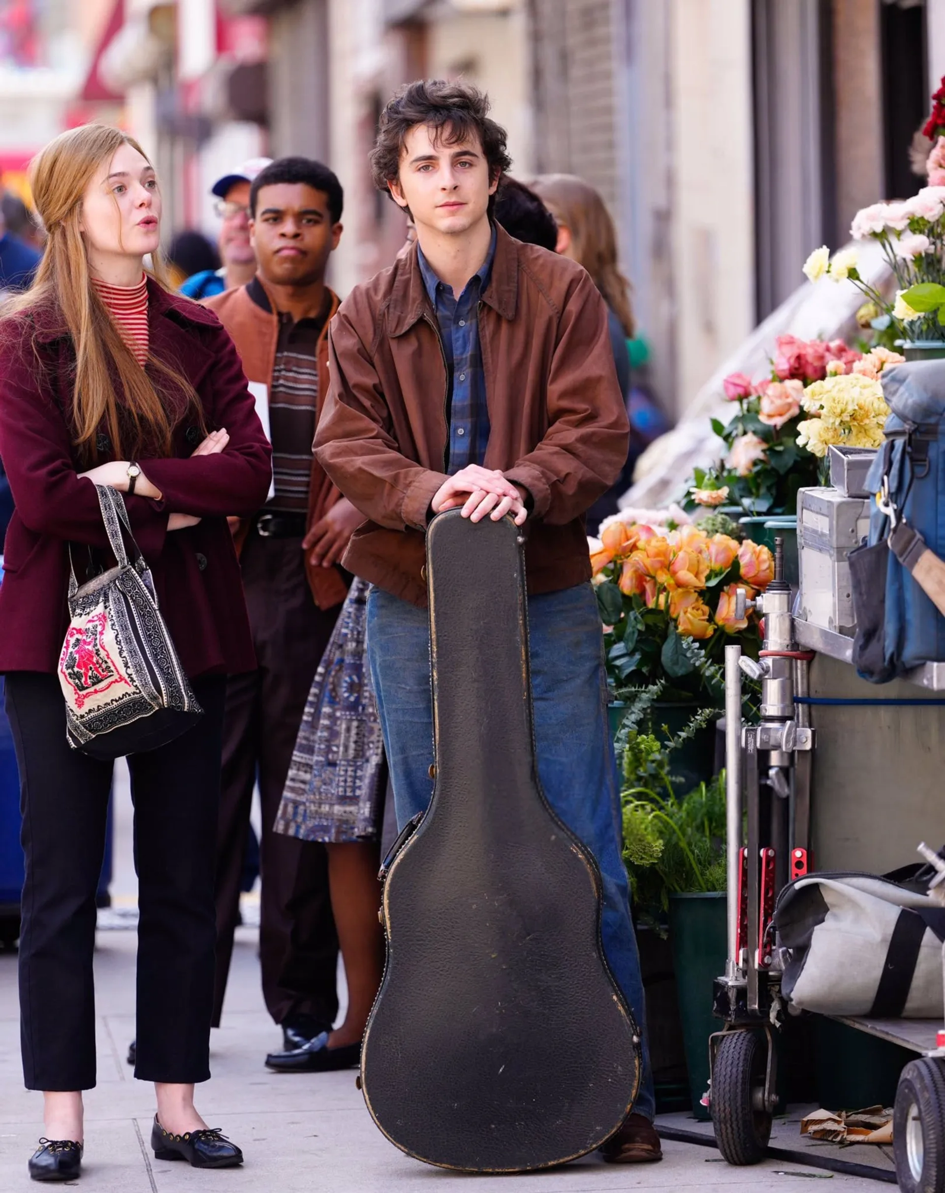Elle Fanning and Timothée Chalamet in A Complete Unknown (2024)