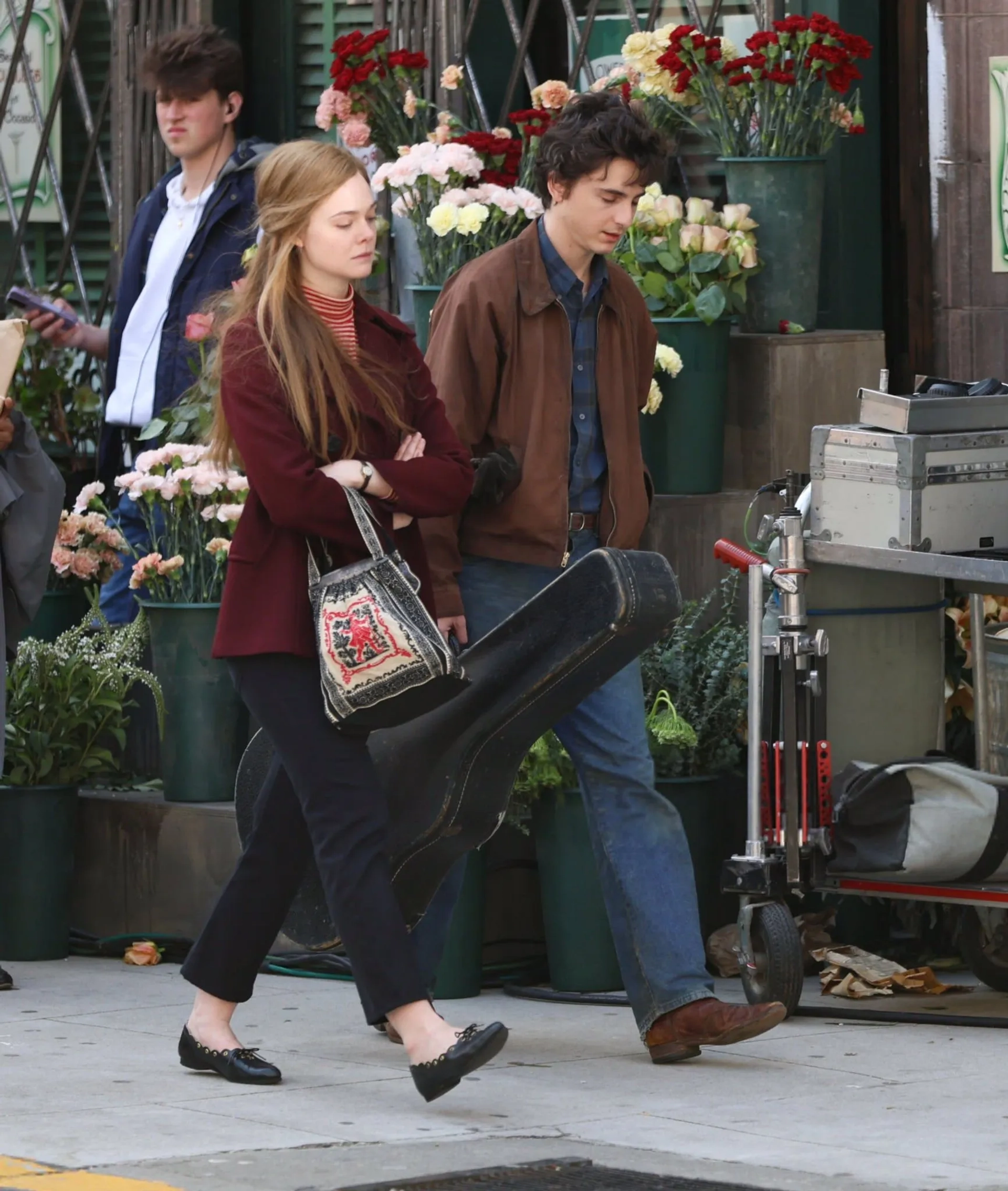 Elle Fanning and Timothée Chalamet in A Complete Unknown (2024)