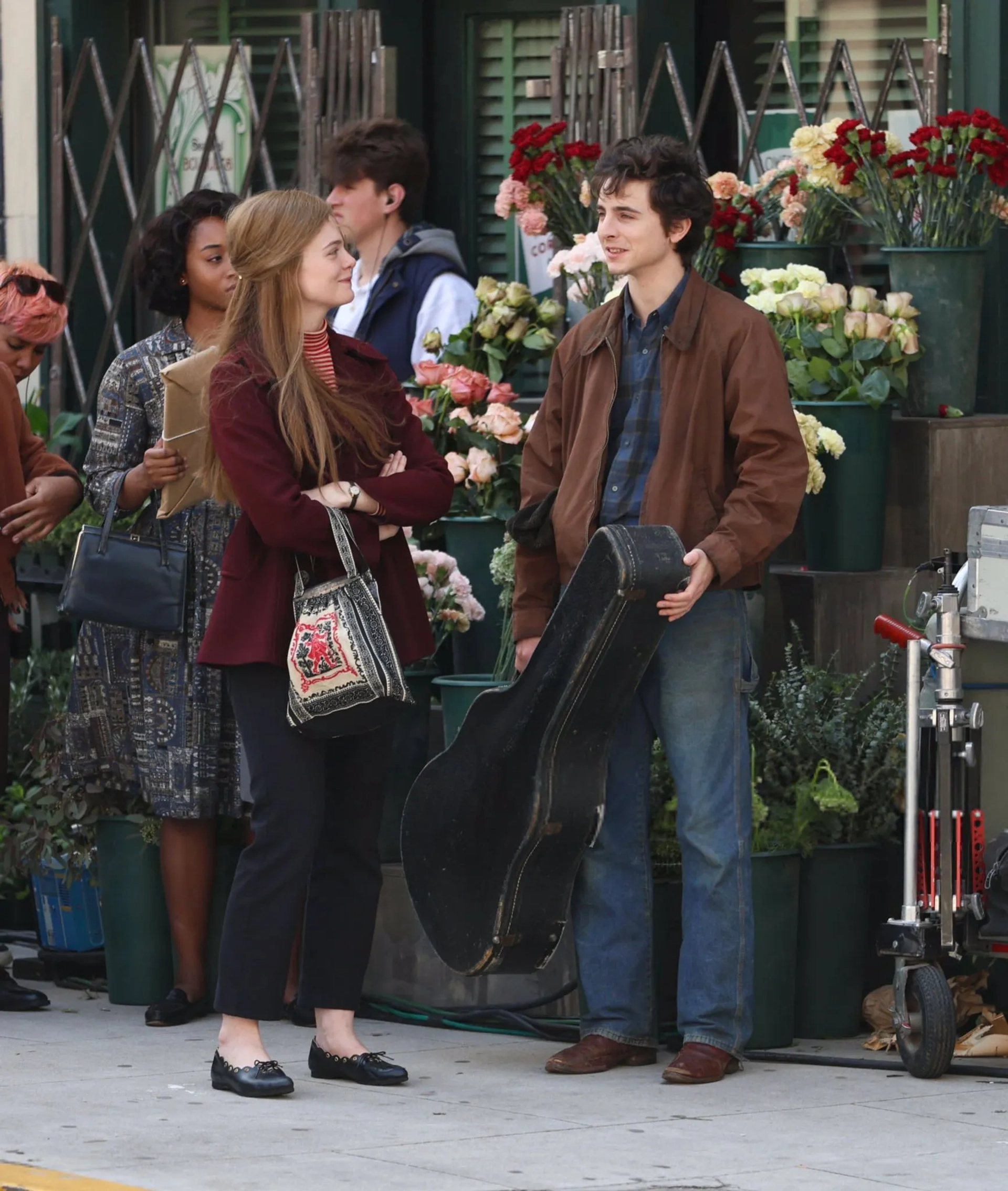 Elle Fanning and Timothée Chalamet in A Complete Unknown (2024)