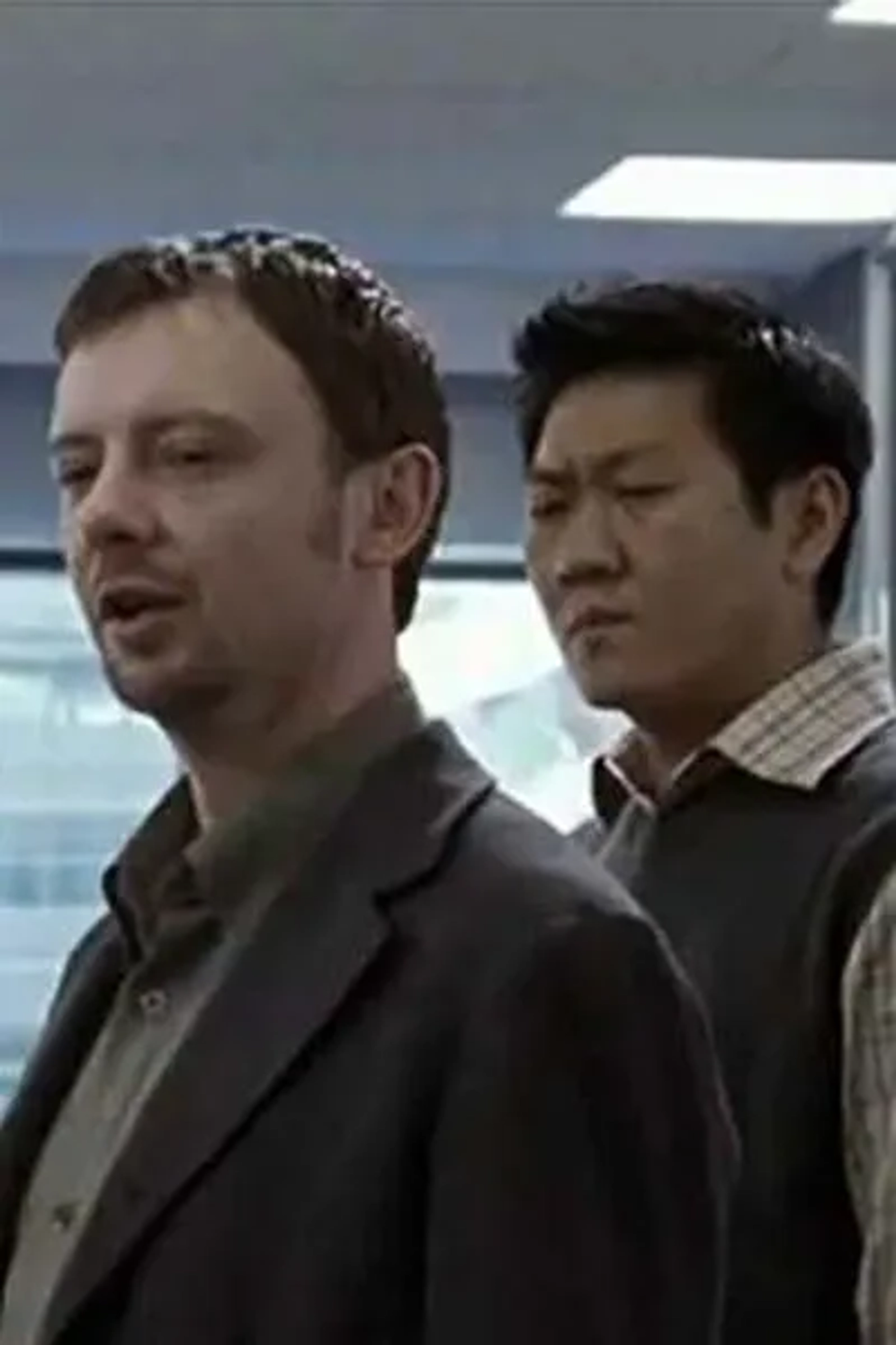 John Simm and Benedict Wong in State of Play (2003)