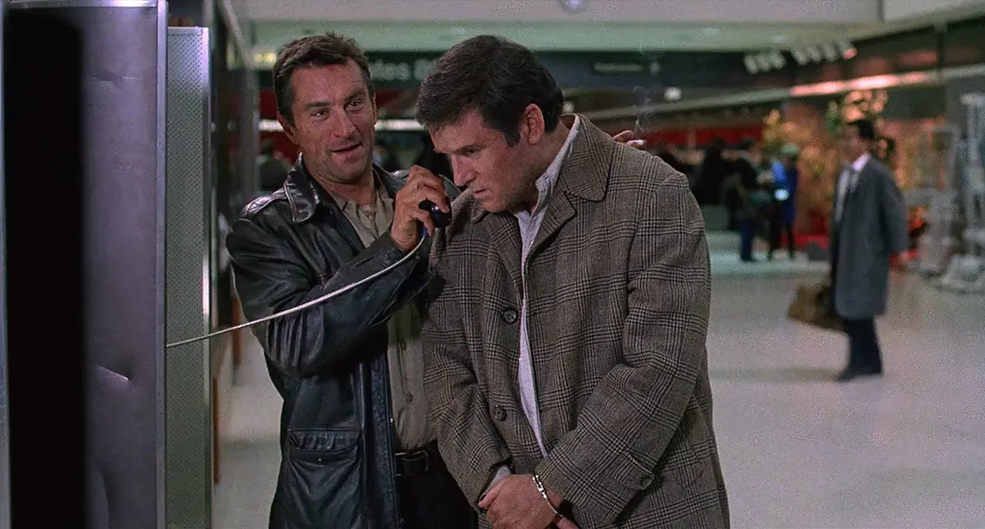 Robert De Niro and Charles Grodin in Midnight Run (1988)