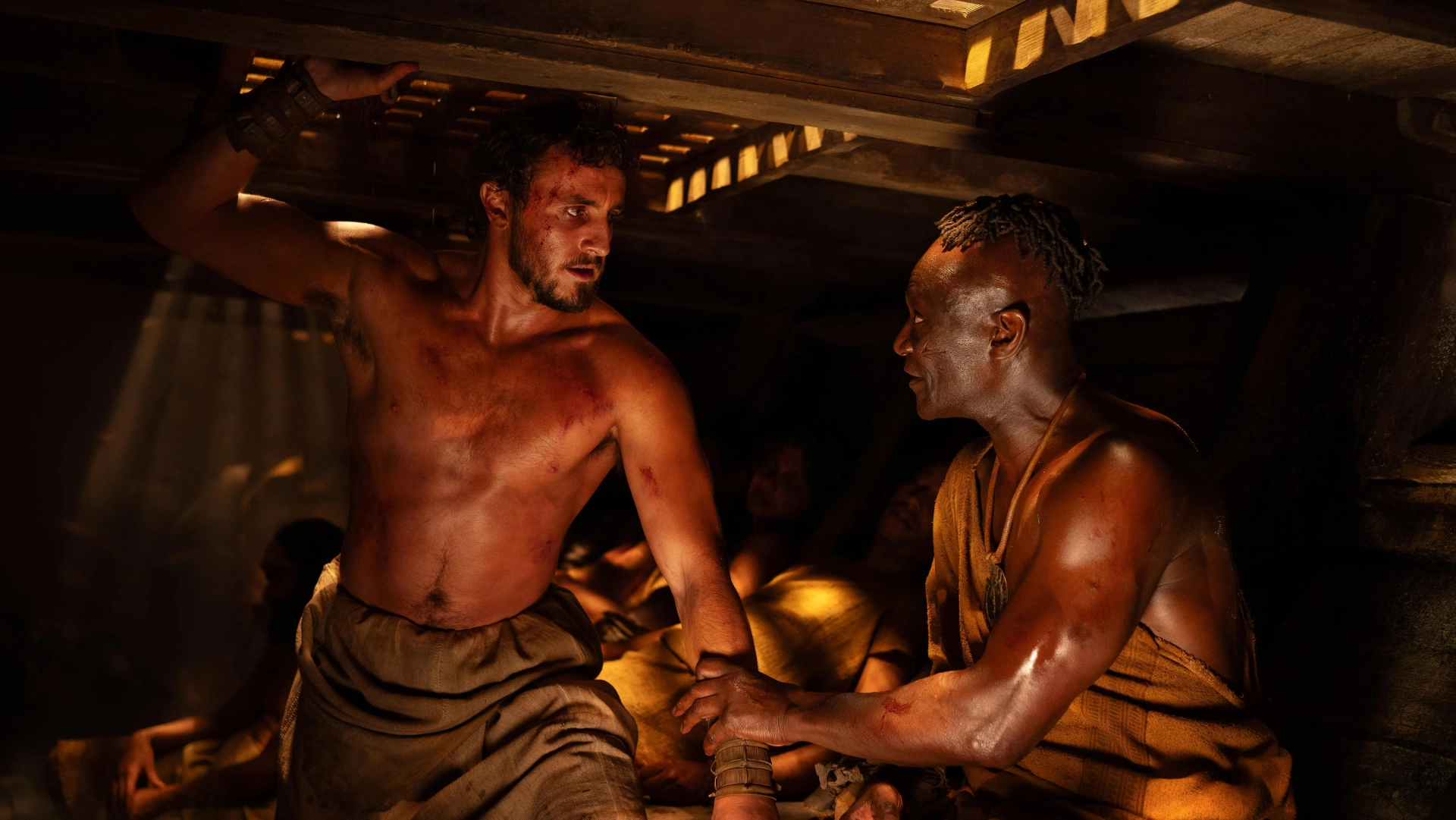 Peter Mensah and Paul Mescal in Gladiator II (2024)