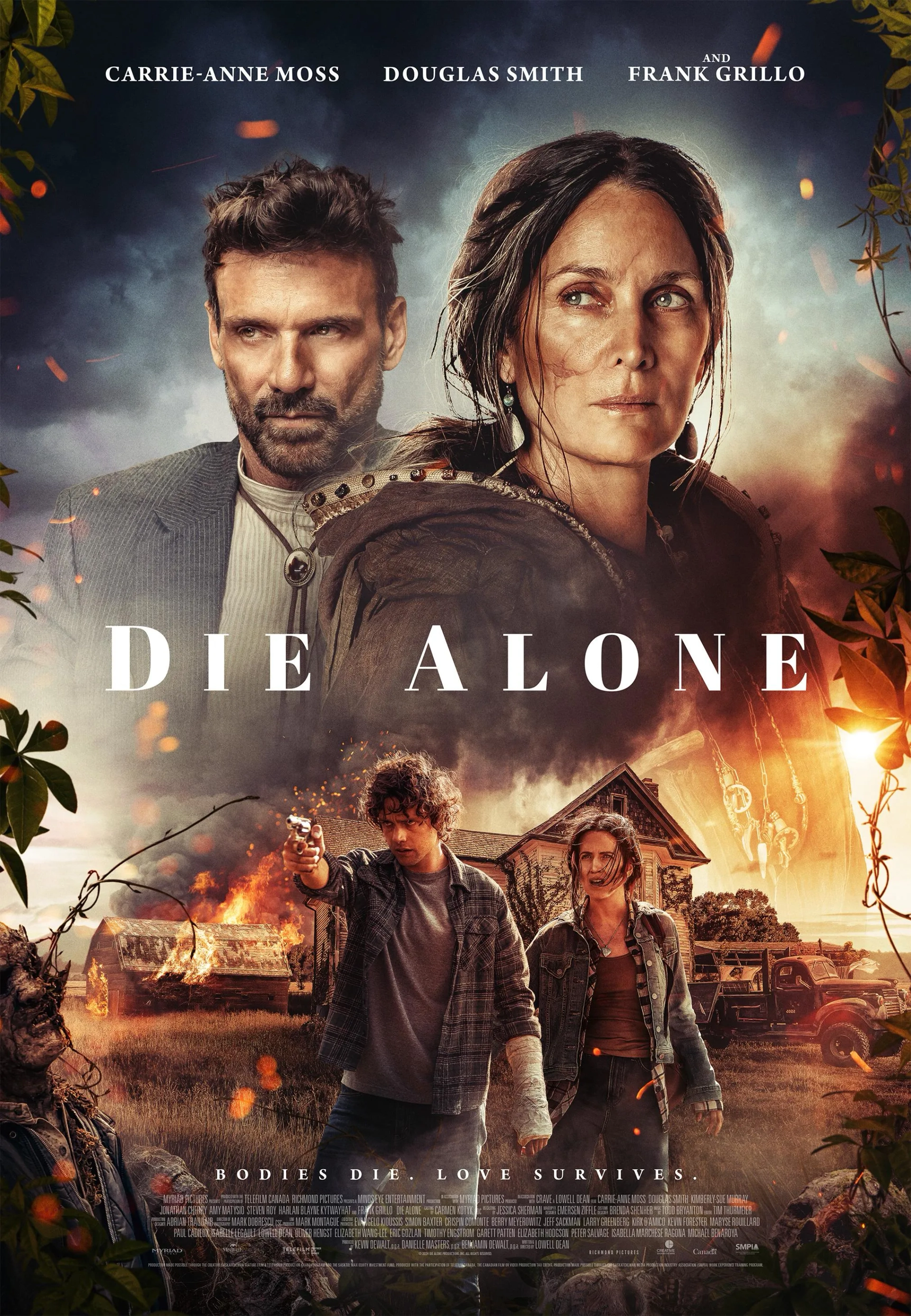 Carrie-Anne Moss, Frank Grillo, and Douglas Smith in Die Alone (2024)