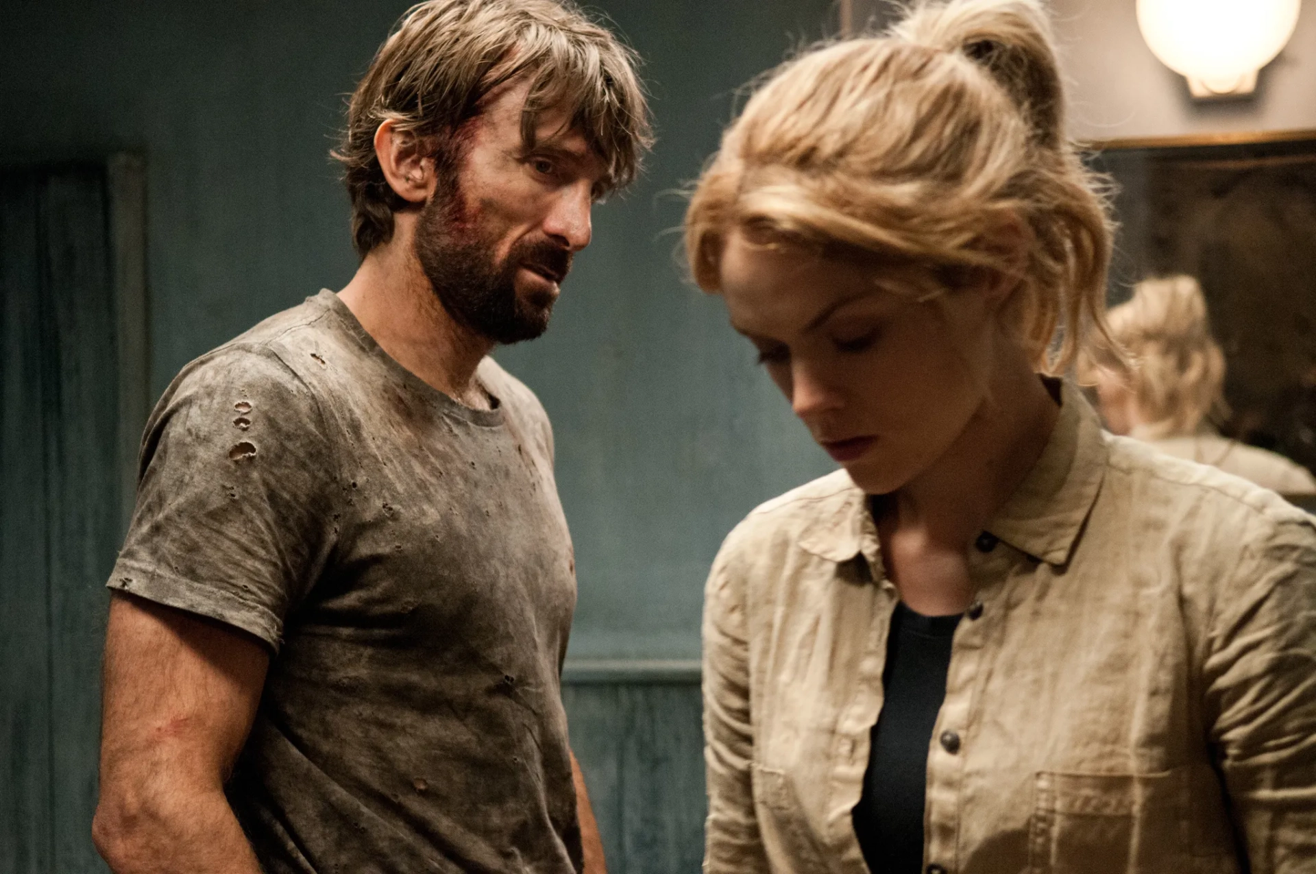 Sharlto Copley and Erin Richards in Open Grave (2013)