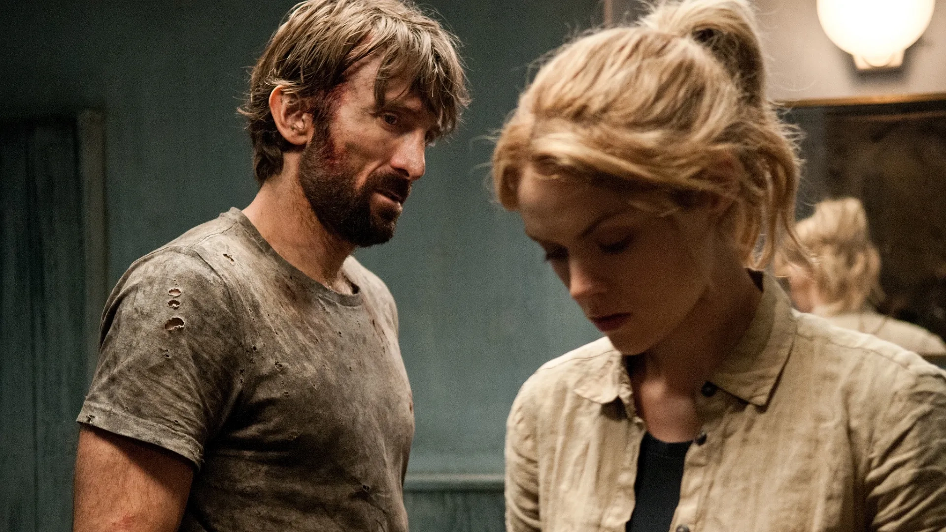 Sharlto Copley and Erin Richards in Open Grave (2013)