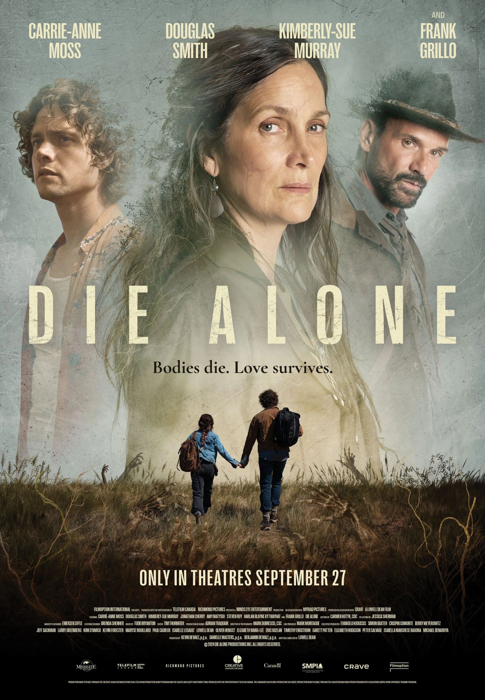 Carrie-Anne Moss, Frank Grillo, and Douglas Smith in Die Alone (2024)