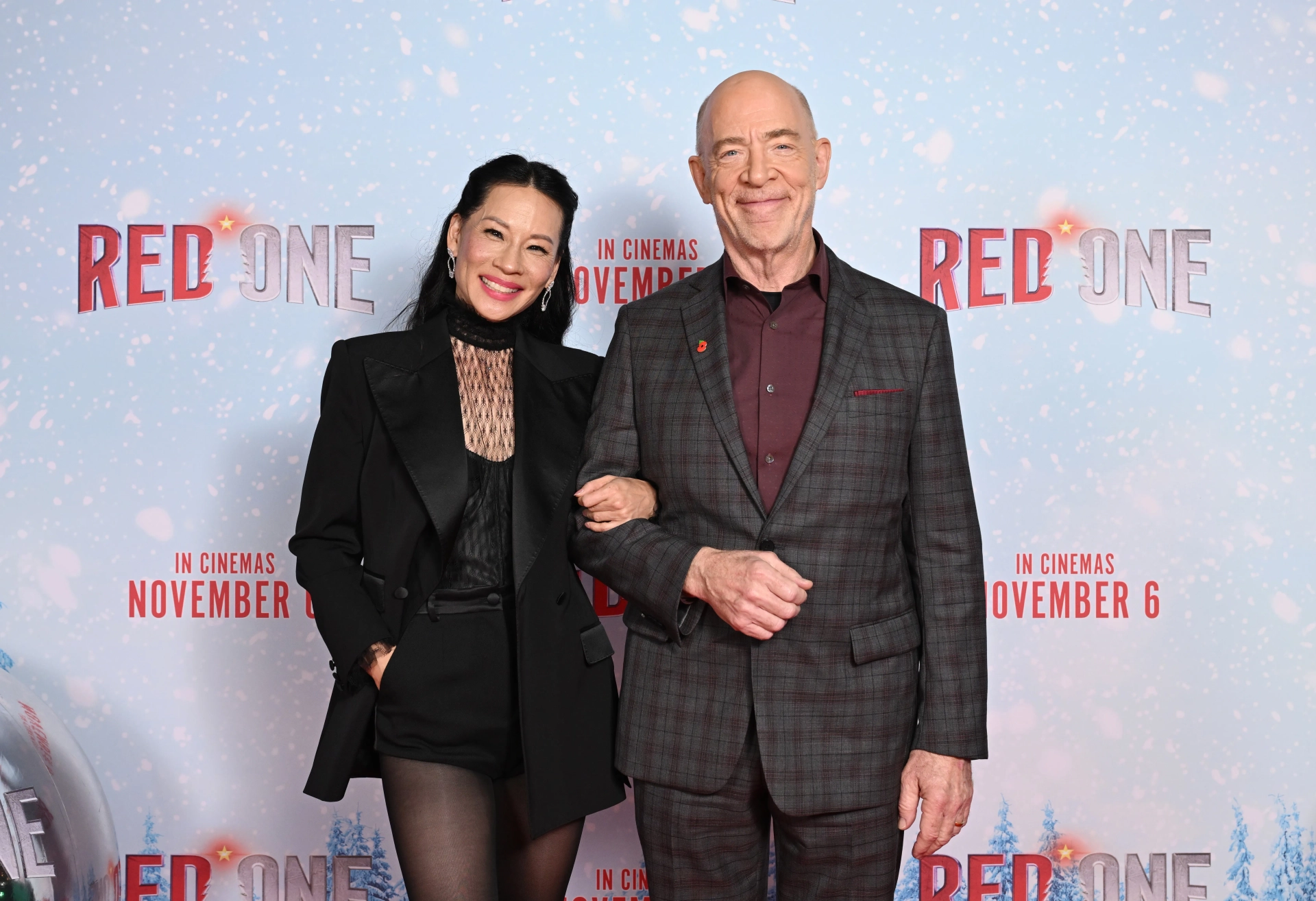 Lucy Liu and J.K. Simmons at an event for Red One (2024)