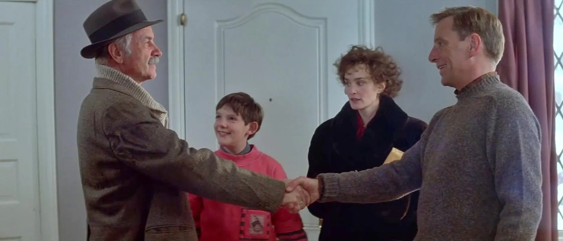 Armin Mueller-Stahl, Lukas Haas, Jessica Lange, and Ned Schmidtke in Music Box (1989)