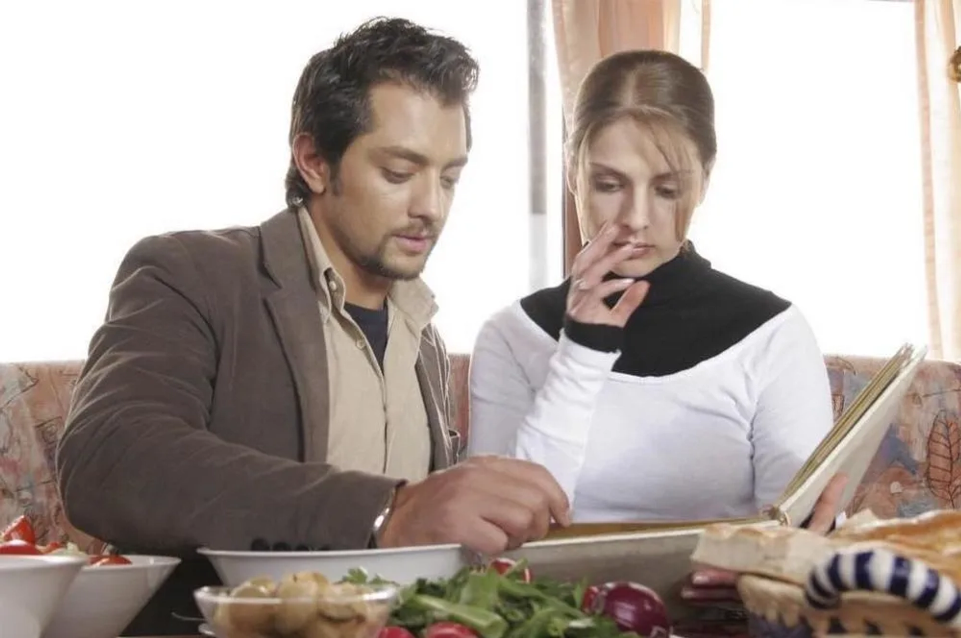 Bahram Radan and Ulrike Kargus in Motherland (2009)