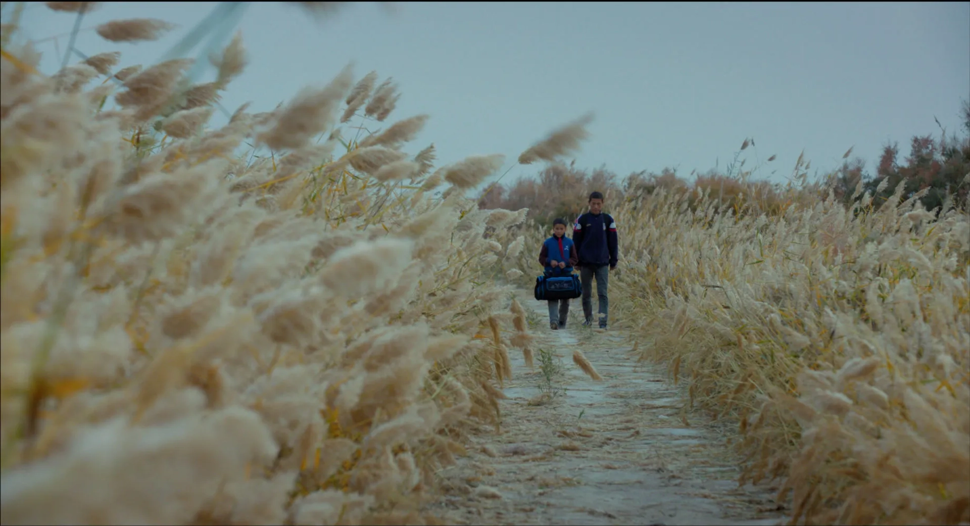 Isa Yasan and Musa Yasan in A First Farewell (2018)
