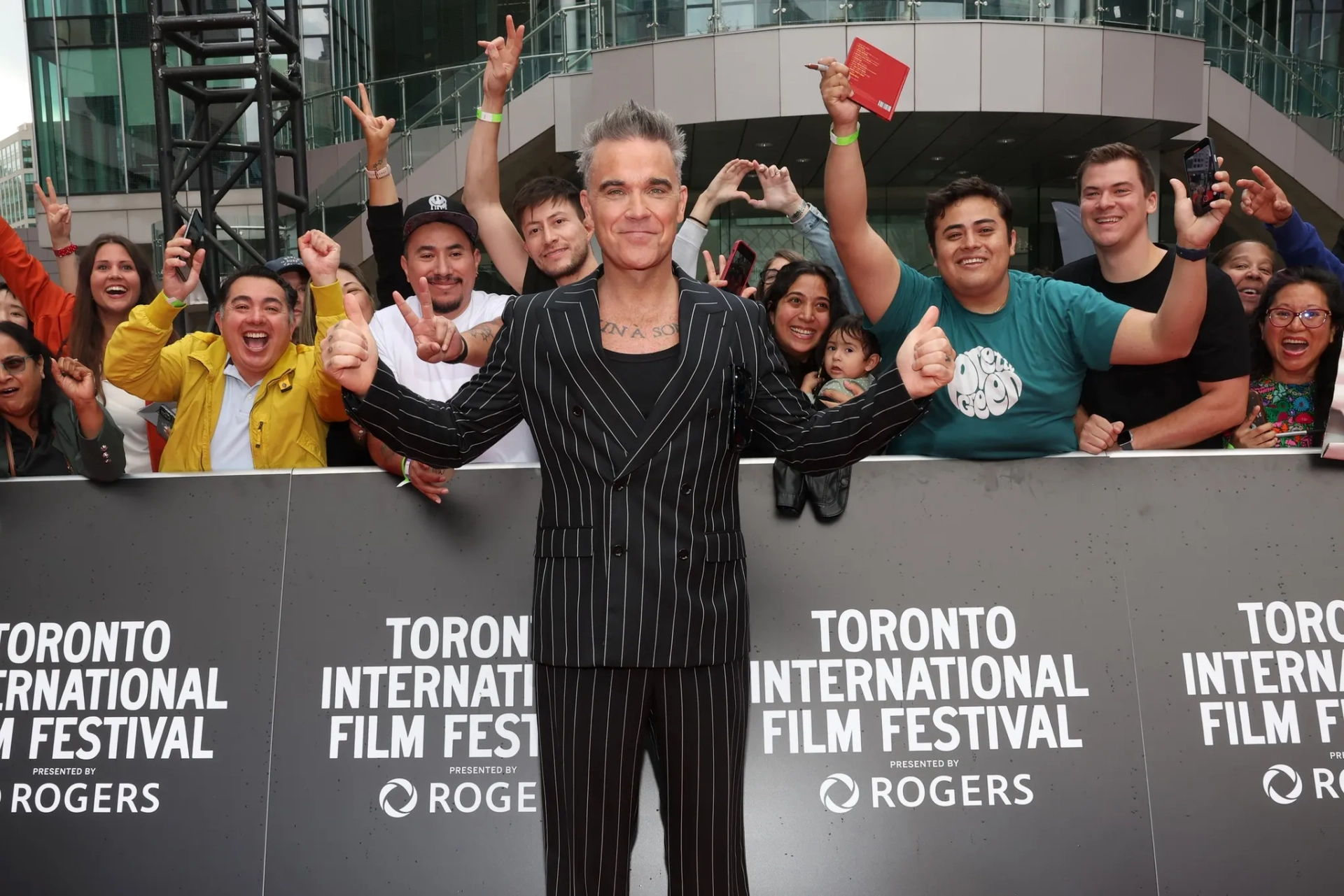 Robbie Williams at an event for Better Man (2024)
