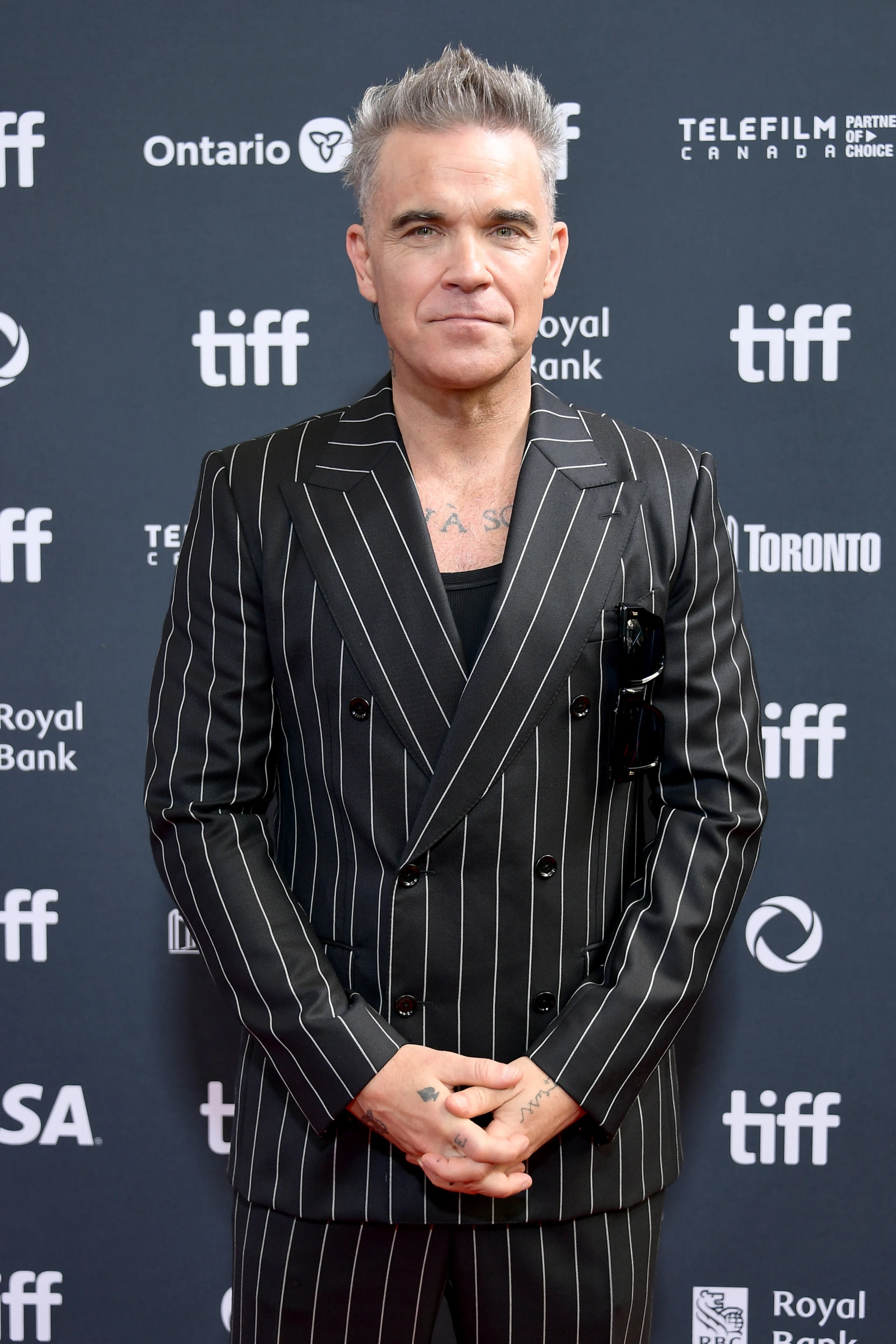 Robbie Williams at an event for Better Man (2024)