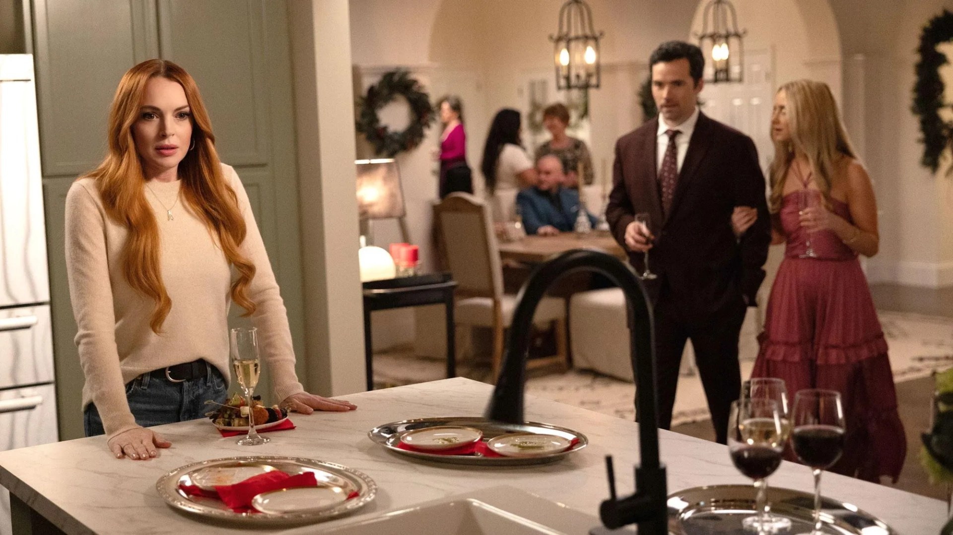 Lindsay Lohan, Ian Harding, and Katie Baker in Our Little Secret (2024)