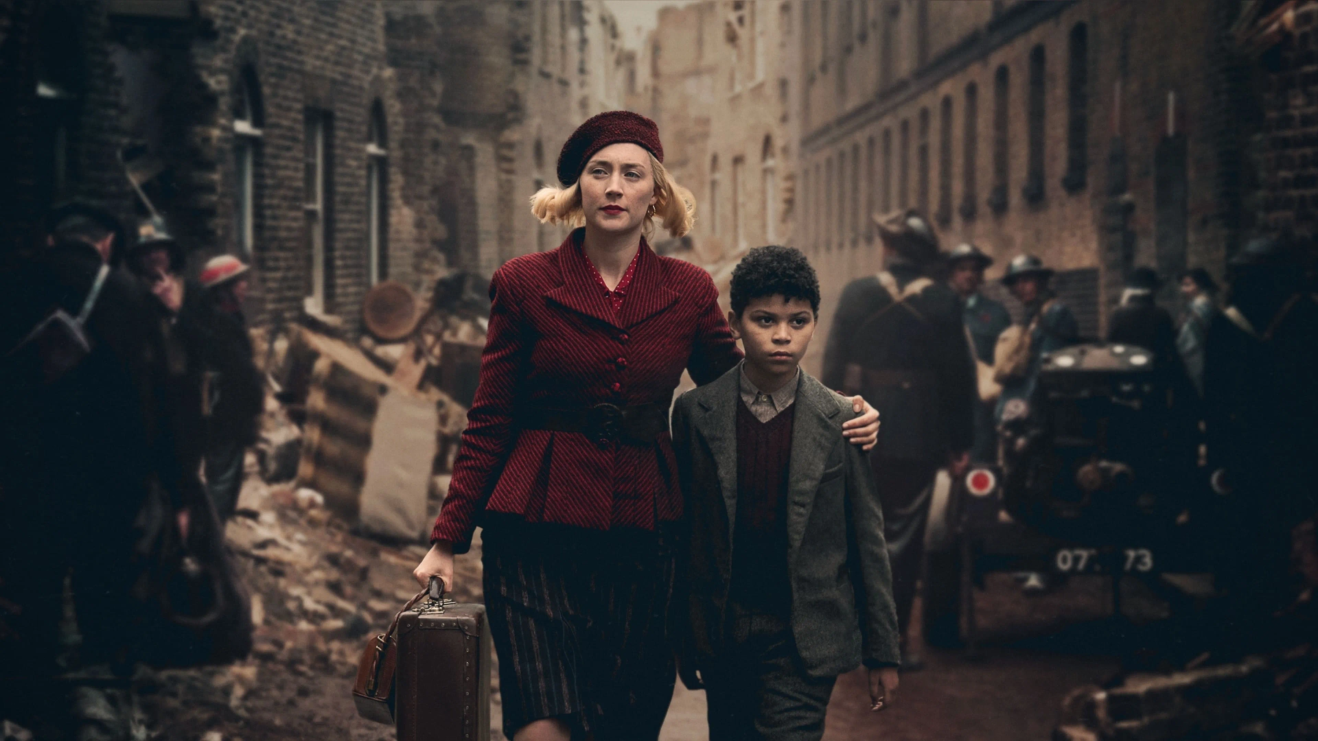 Elliott Heffernan and Saoirse Ronan in Blitz (2024)