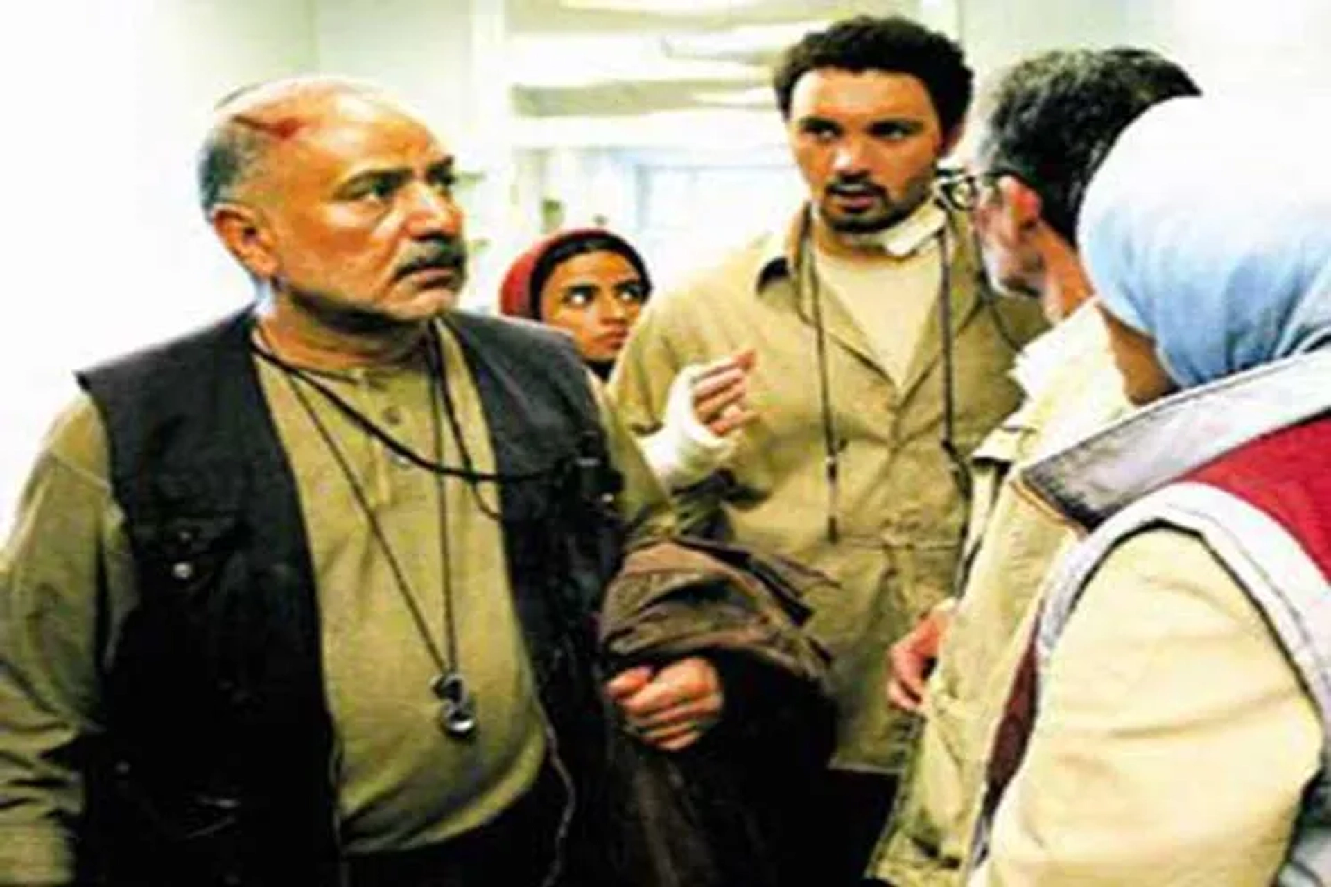 Parviz Parastui and Kambiz Dirbaz in In the Name of the Father (2006)