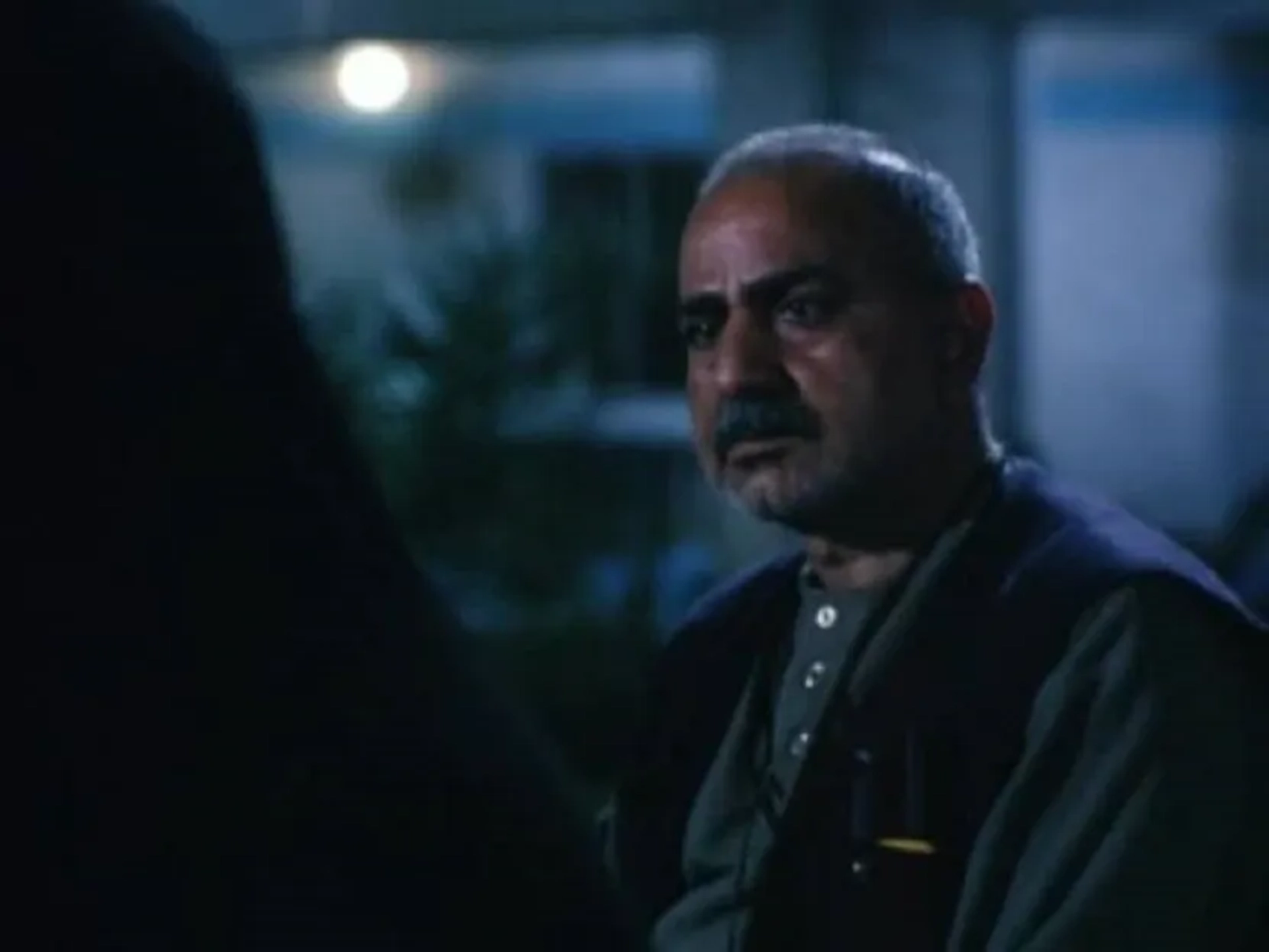 Parviz Parastui in In the Name of the Father (2006)