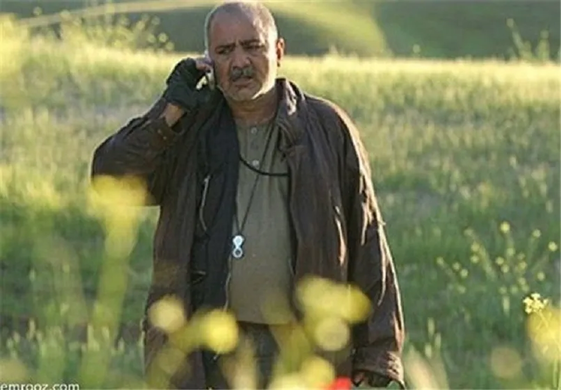 Parviz Parastui in In the Name of the Father (2006)