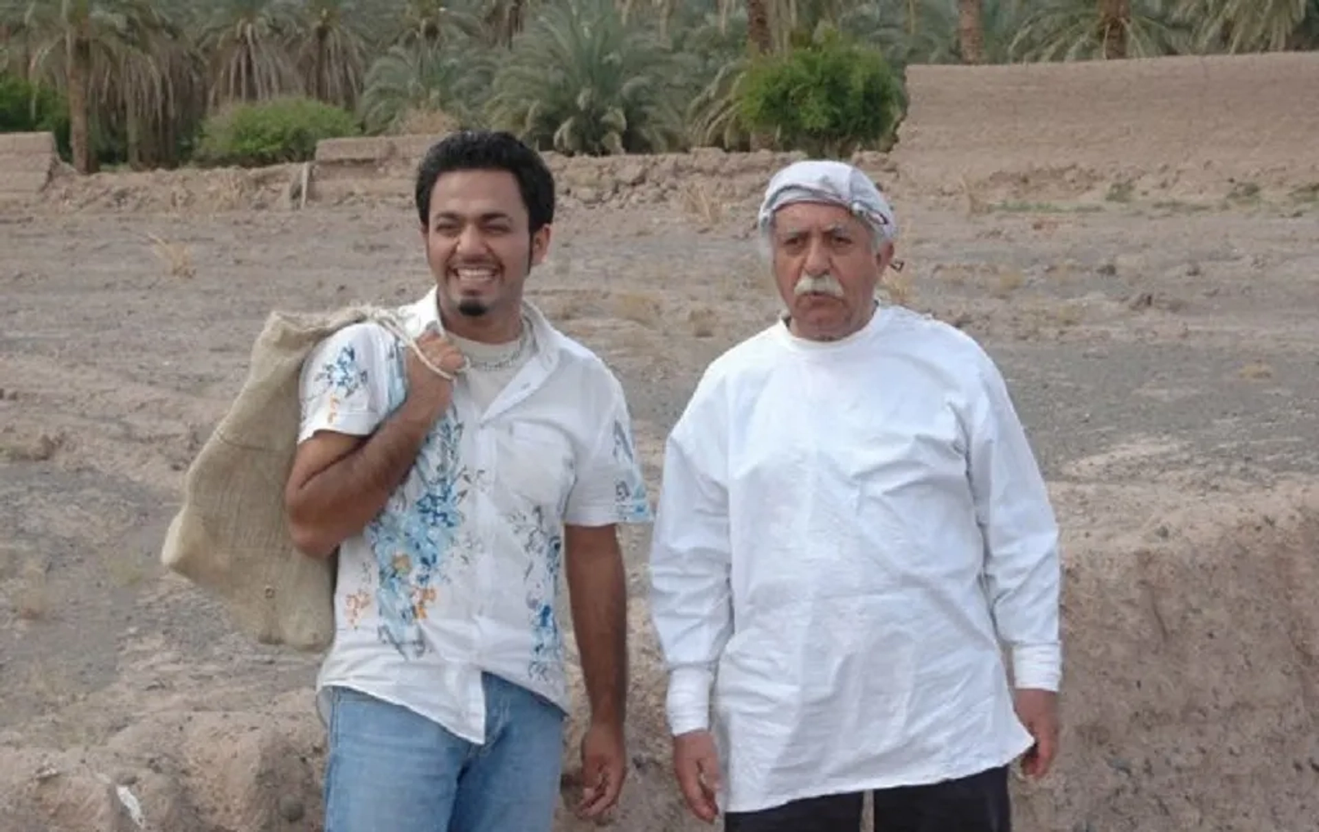 Ezzatolah Entezami and Saber Abar in Colors of Memory (2007)