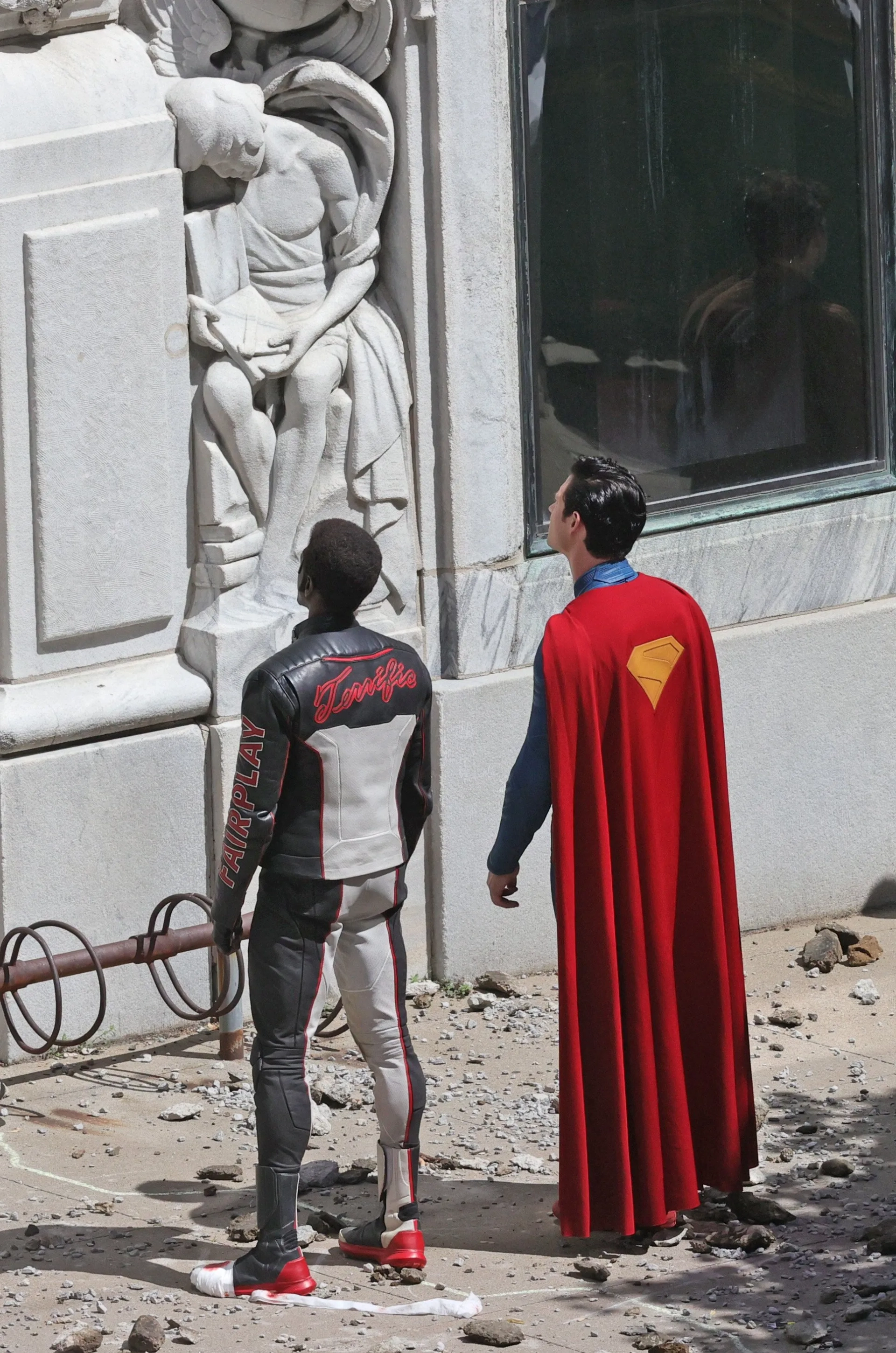 Edi Gathegi and David Corenswet in Superman (2025)