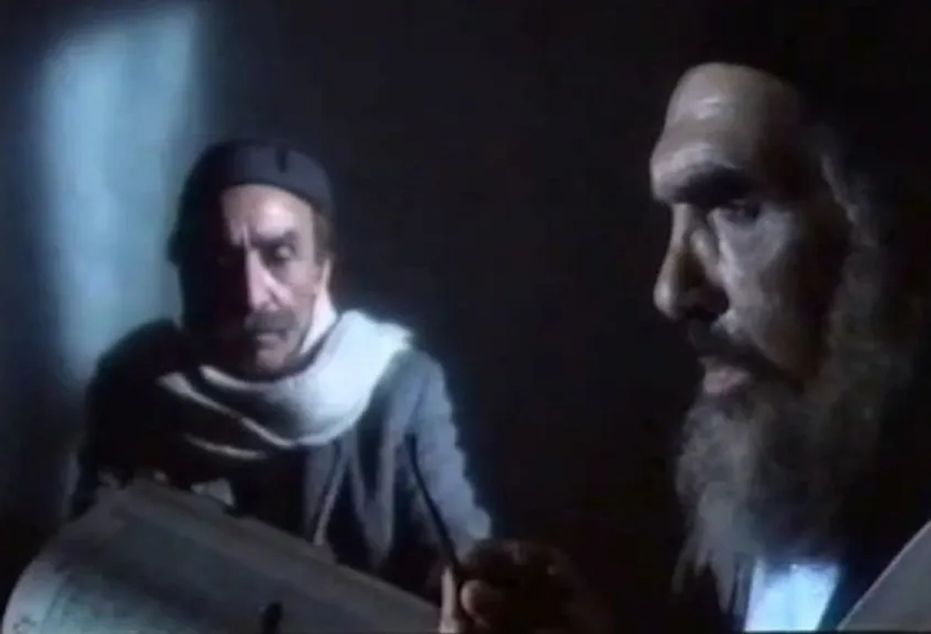 Hamed Tahassoni and Ataollah Zahed in The Spell (1987)