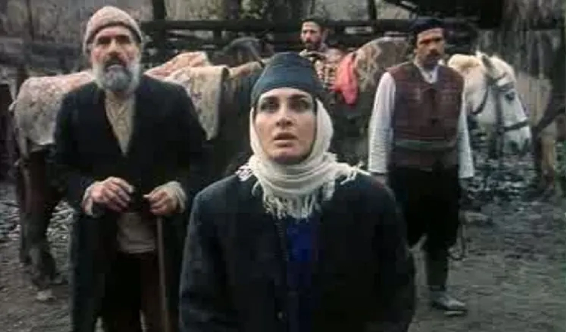 Firouz Behjat Mohammadi, Susan Taslimi, and Ataollah Zahed in The Mare (1986)