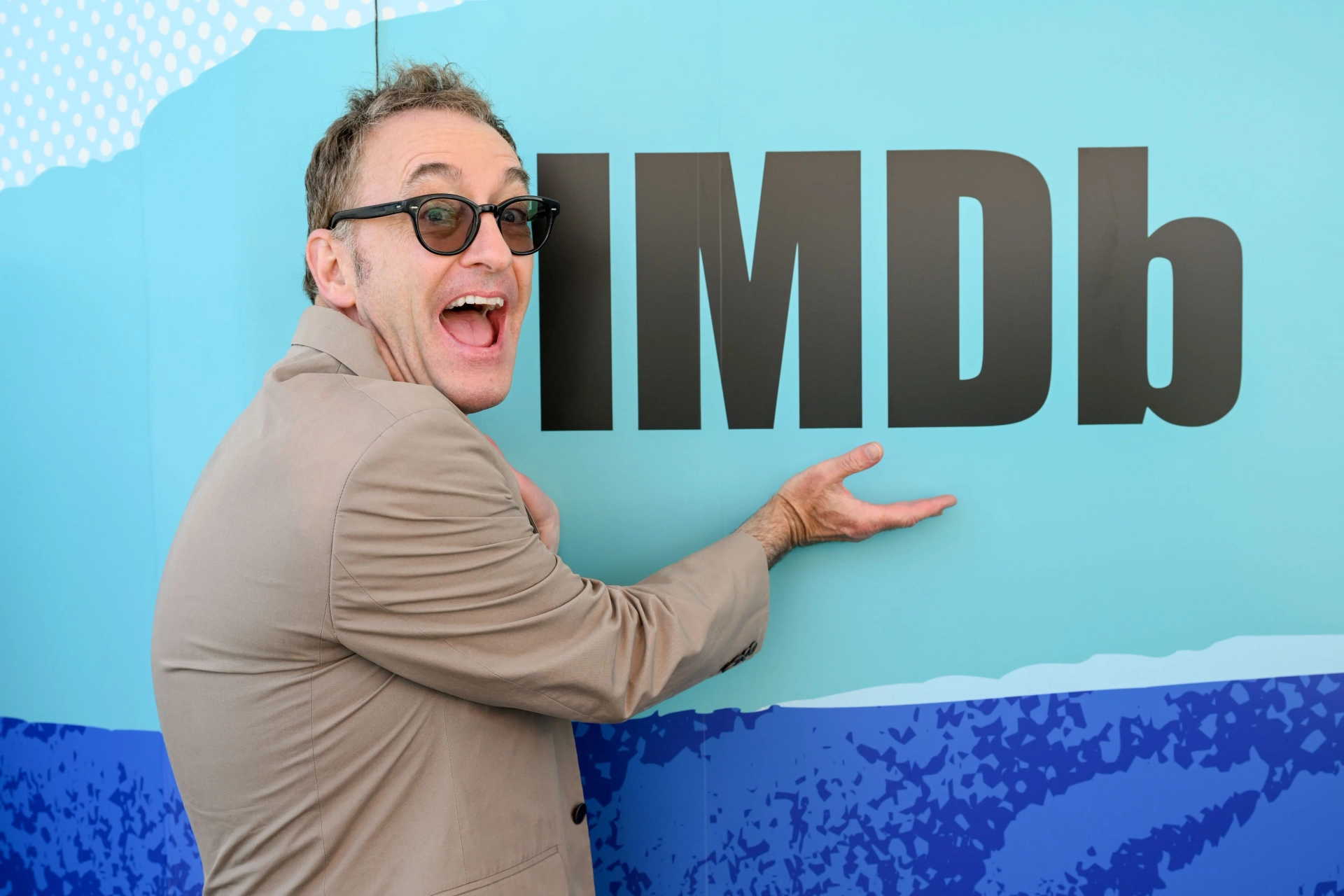 Tom Kenny at an event for The SpongeBob Movie: Search for Squarepants (2025)