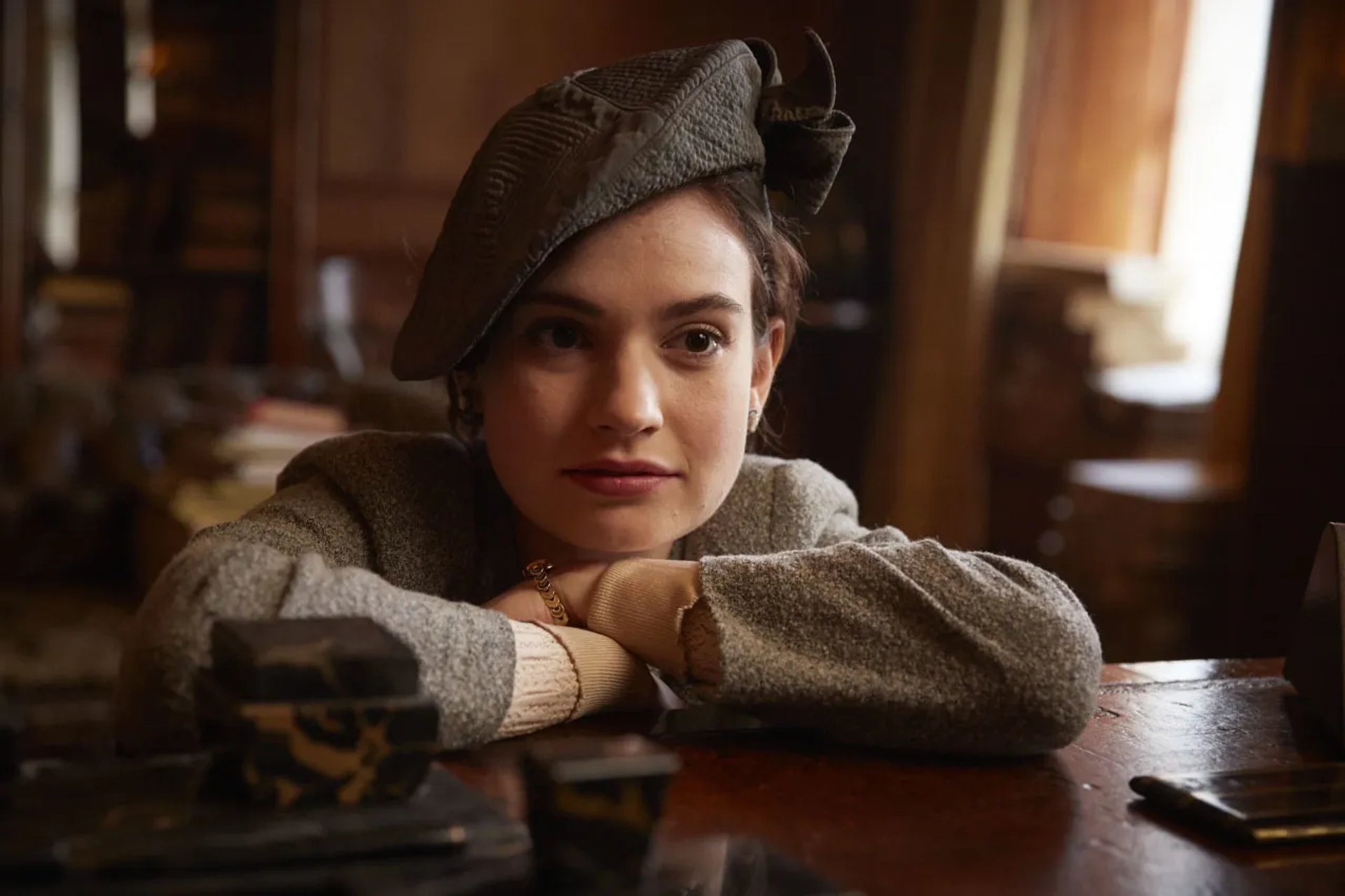 Lily James in The Guernsey Literary and Potato Peel Pie Society (2018)