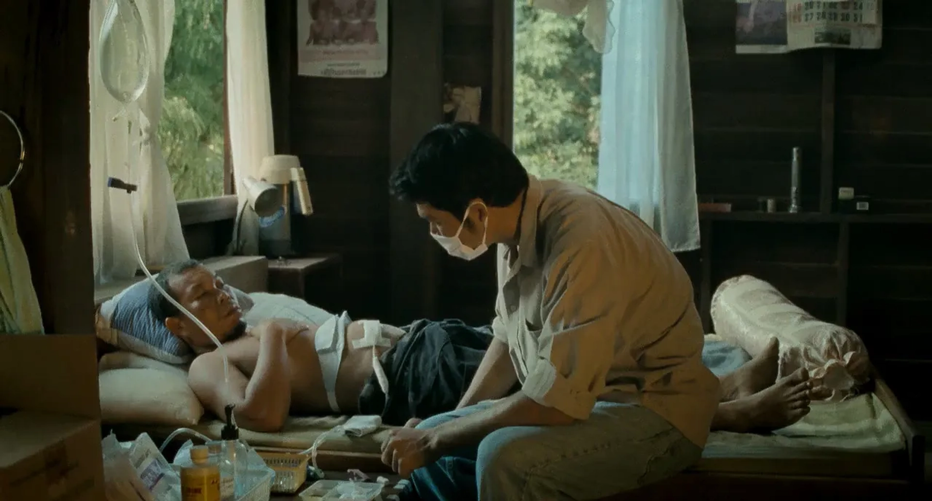 Thanapat Saisaymar and Samud Kugasang in Uncle Boonmee Who Can Recall His Past Lives (2010)