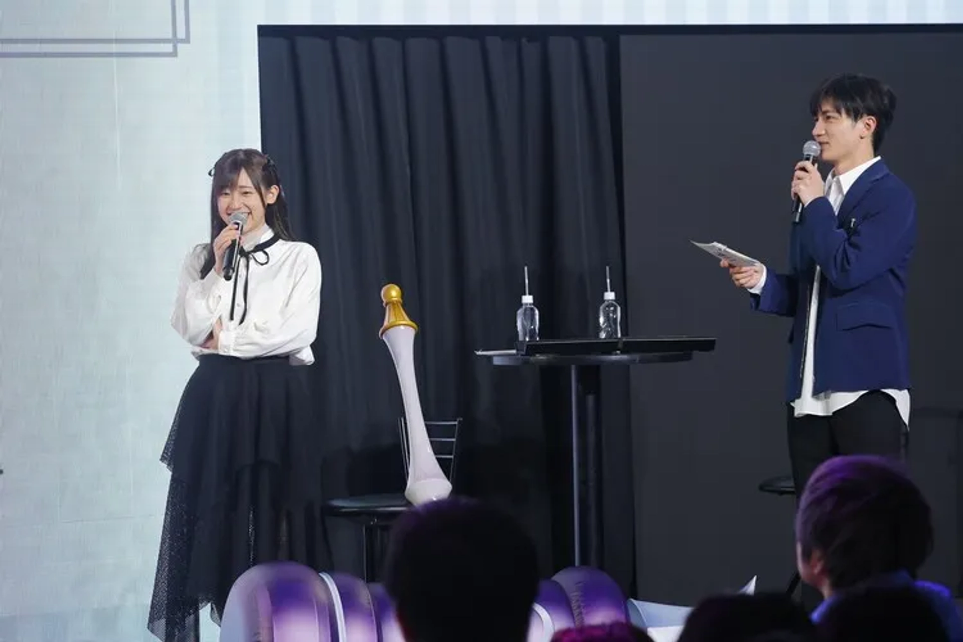 Rie Takahashi and Kentarô Kumagai at an event for I May Be a Guild Receptionist, but I'll Solo Any Boss to Clock Out on Time (2024)