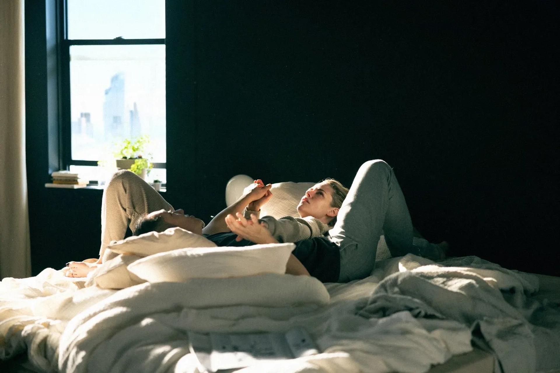 Kristen Stewart and Steven Yeun in Love Me (2024)