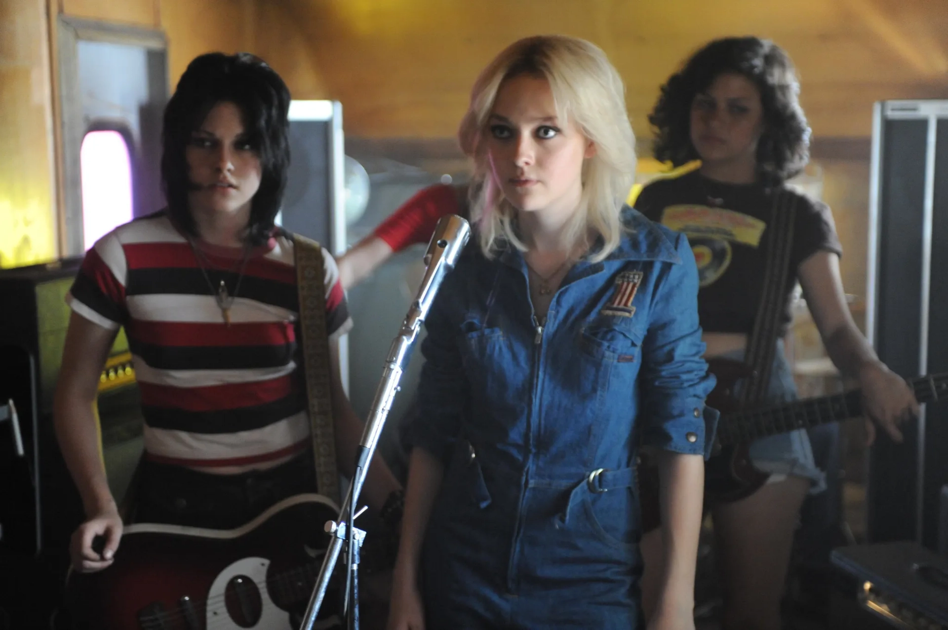 Dakota Fanning, Alia Shawkat, and Kristen Stewart in The Runaways (2010)