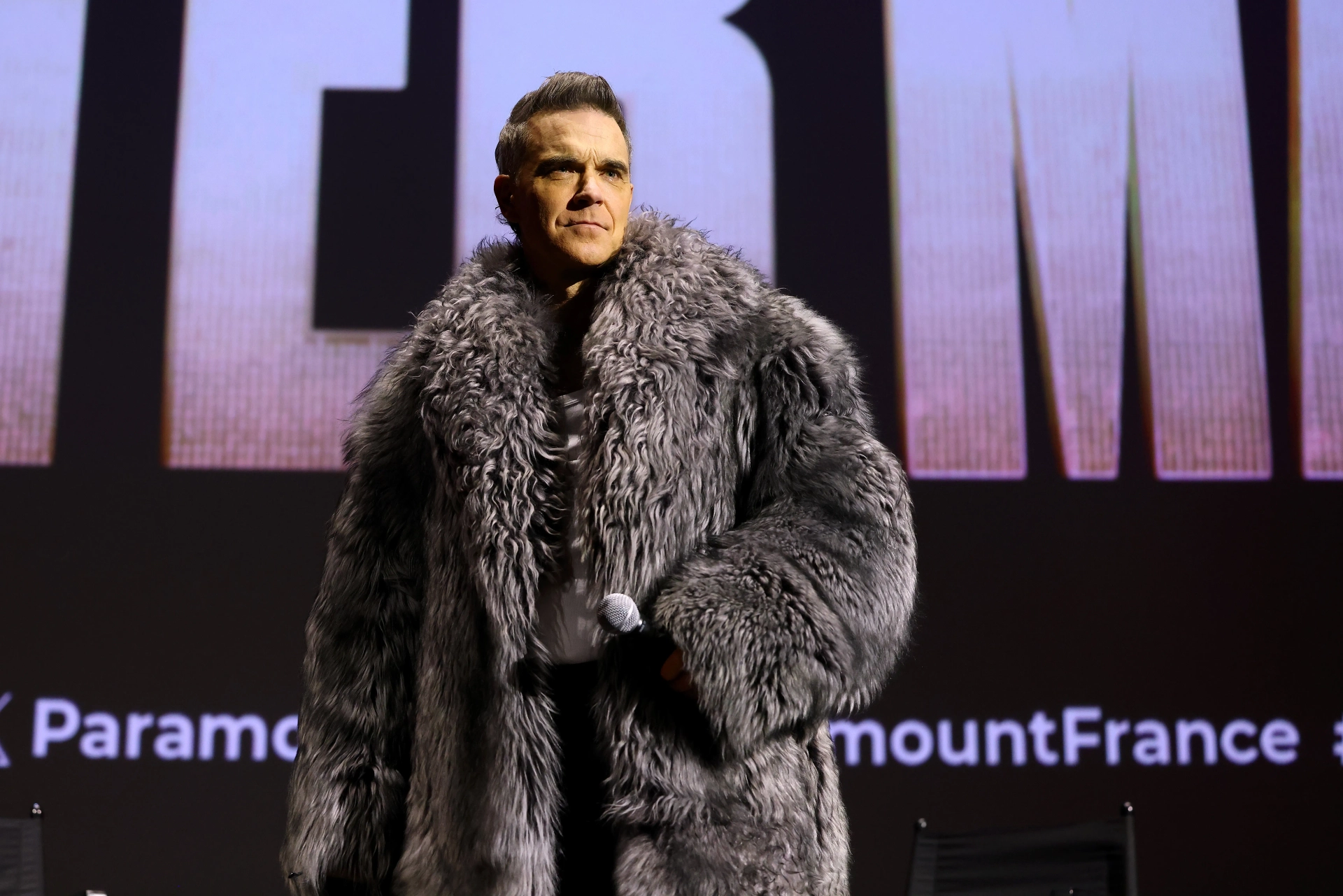 Robbie Williams at an event for Better Man (2024)