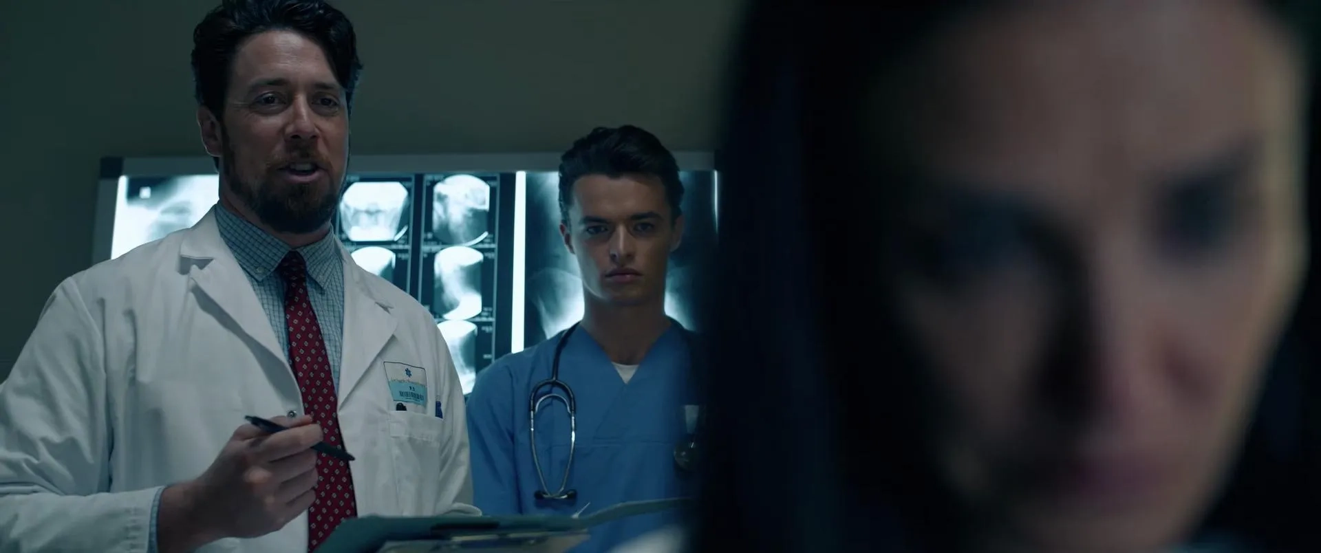Demi Moore, Robin Greer, and Tom Morton in The Substance (2024)